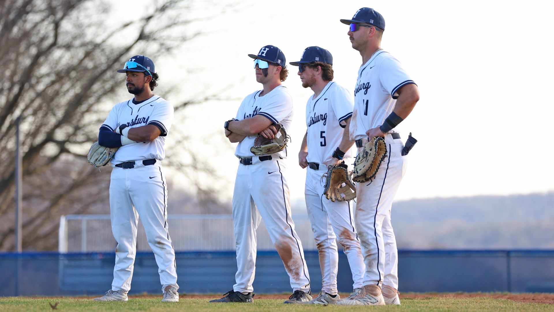 penn state harrisburg infielders alex ruiz, nate lapp, tim haftl and demetre koutras stand behind the pitcher during a win over york (pa.) in 2026