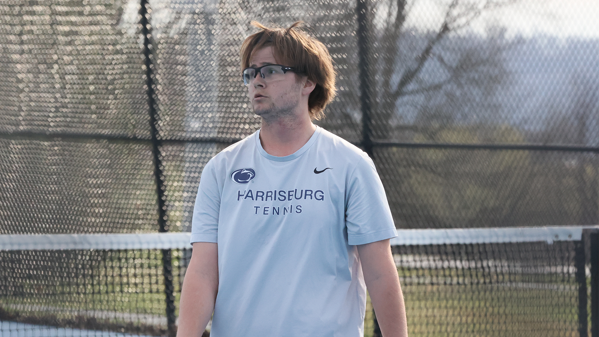 rivino looks on after playing a singles point