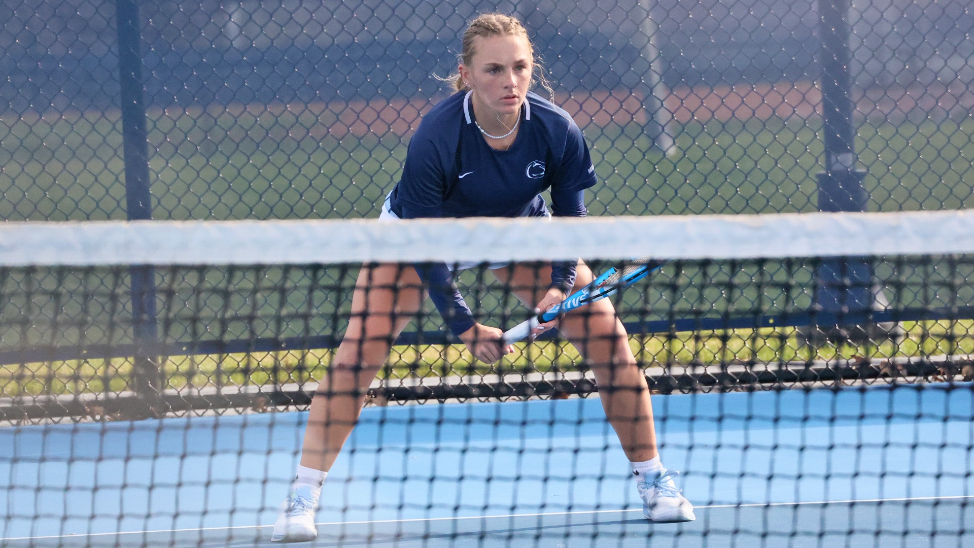 Kiersten Strohecker prepares for a serve at the hoverter tennis complex