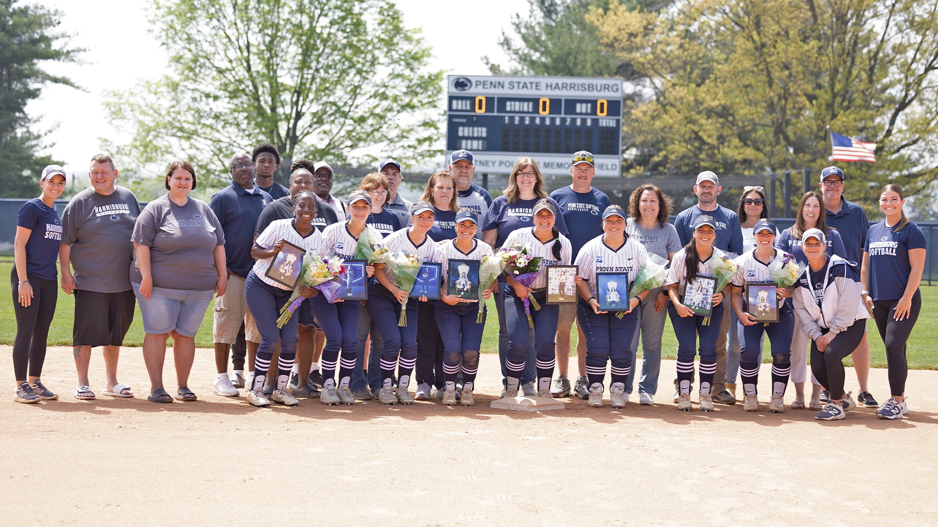 the 2026 softball team poses with the team's seniors 