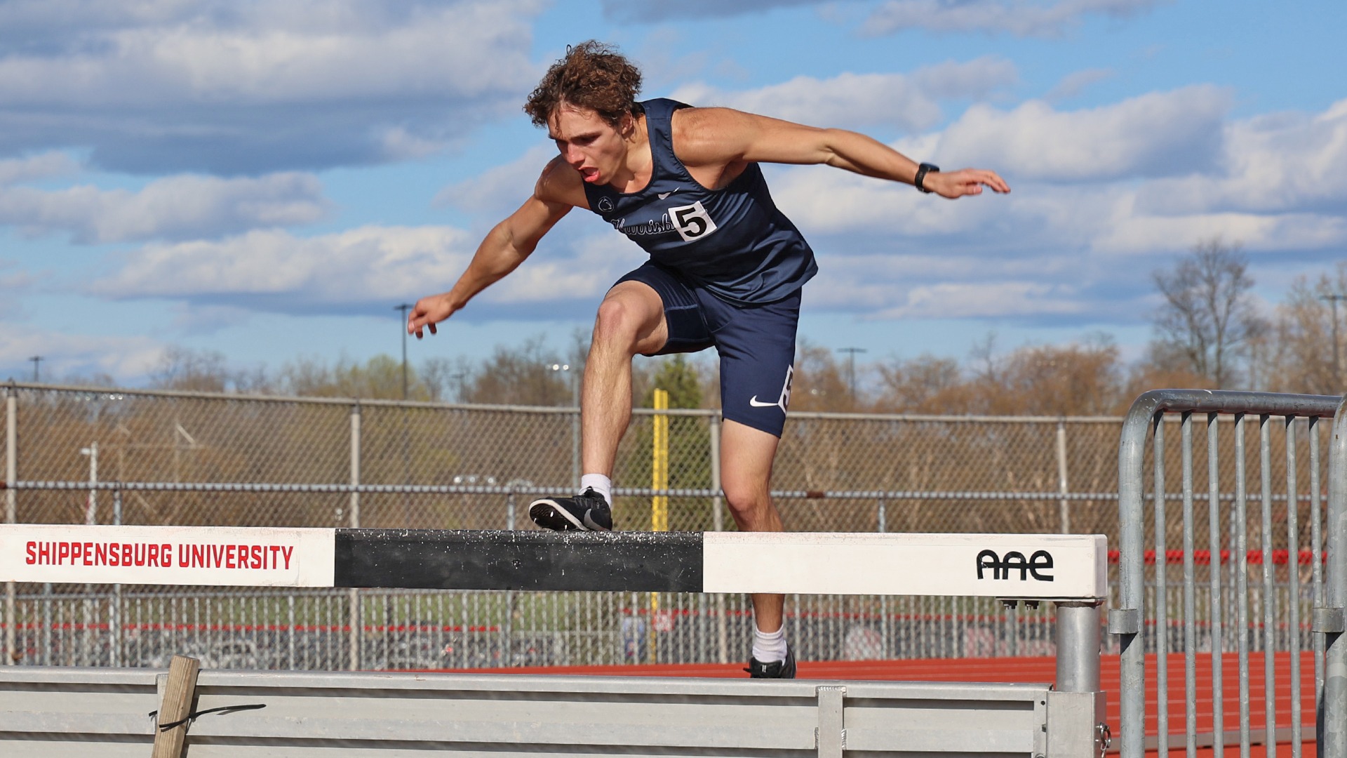 zack gibson runs the 3,000m steeplechase during a meet at shippnesburg in 2025