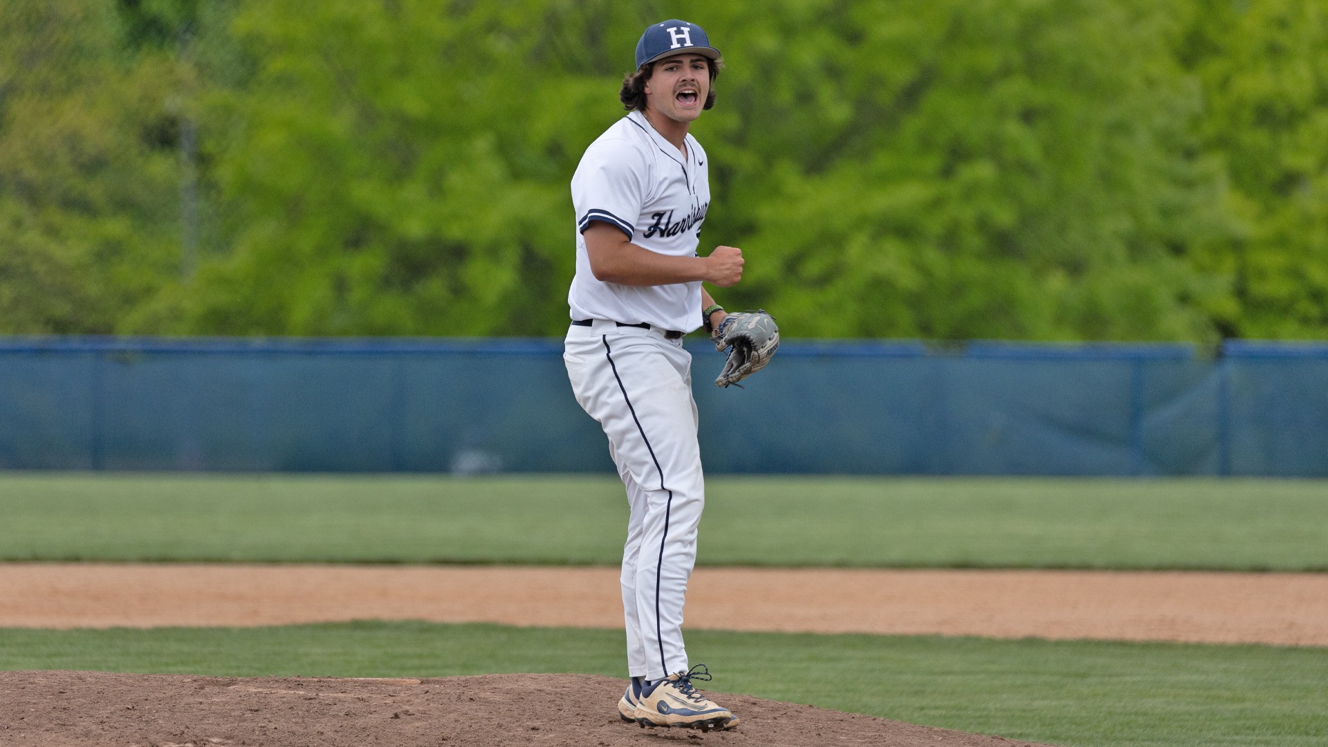 cade baker celebrates after winning an united east playoff game against valley forge