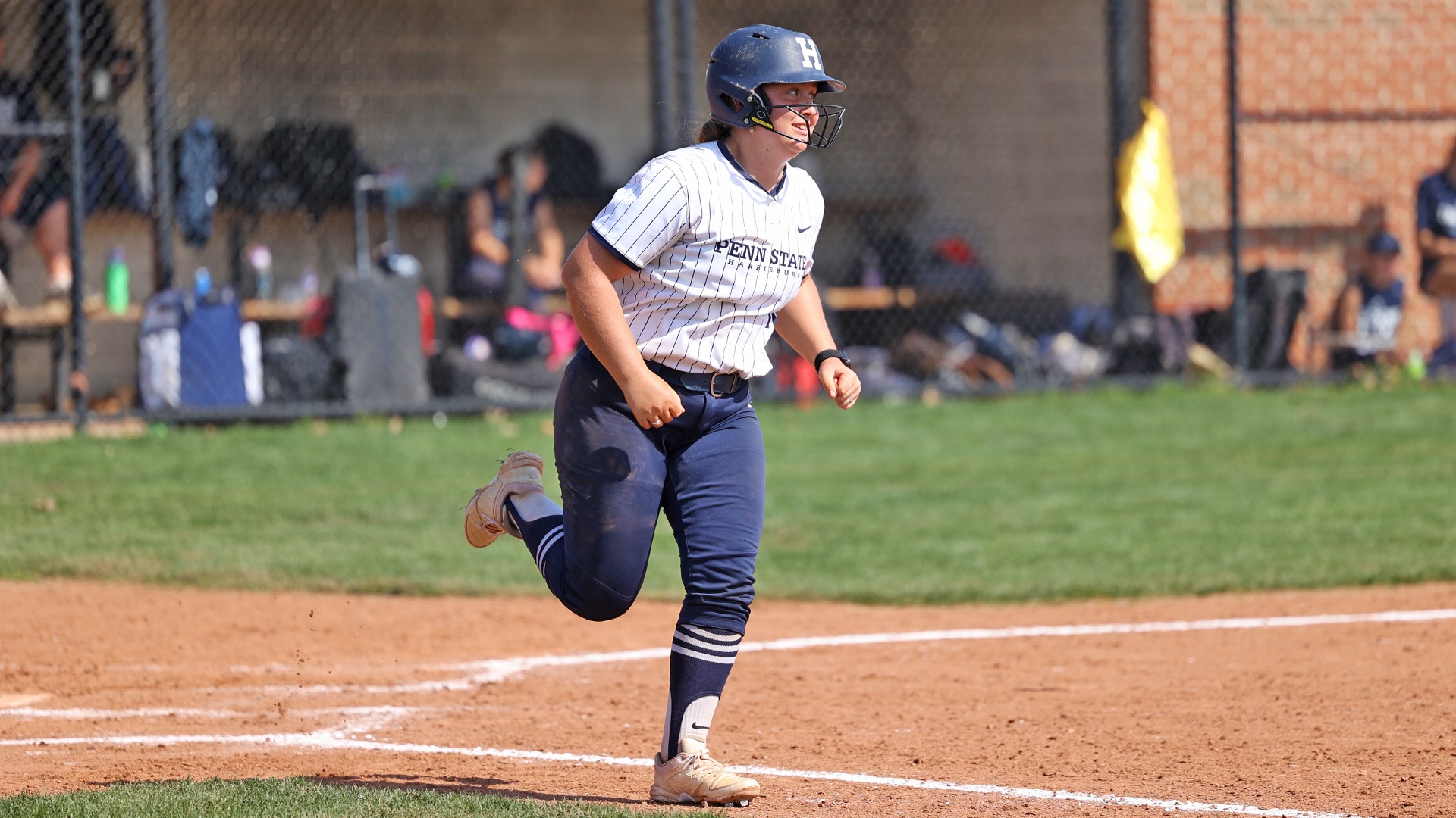emily cutman runs the bases after hitting a ball at courtney pollock field