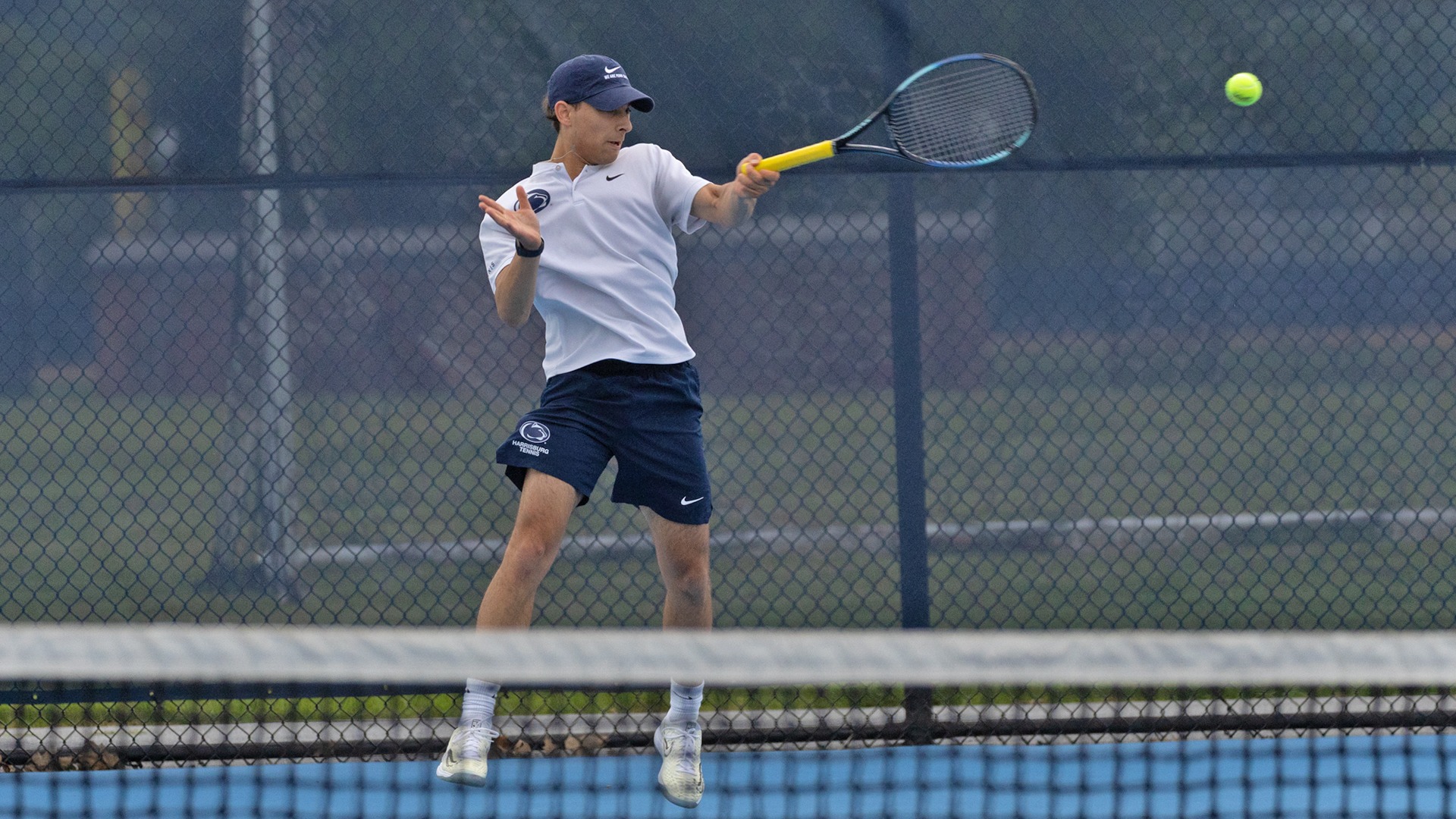 ian opitz hits a ball in a win over penn state berks