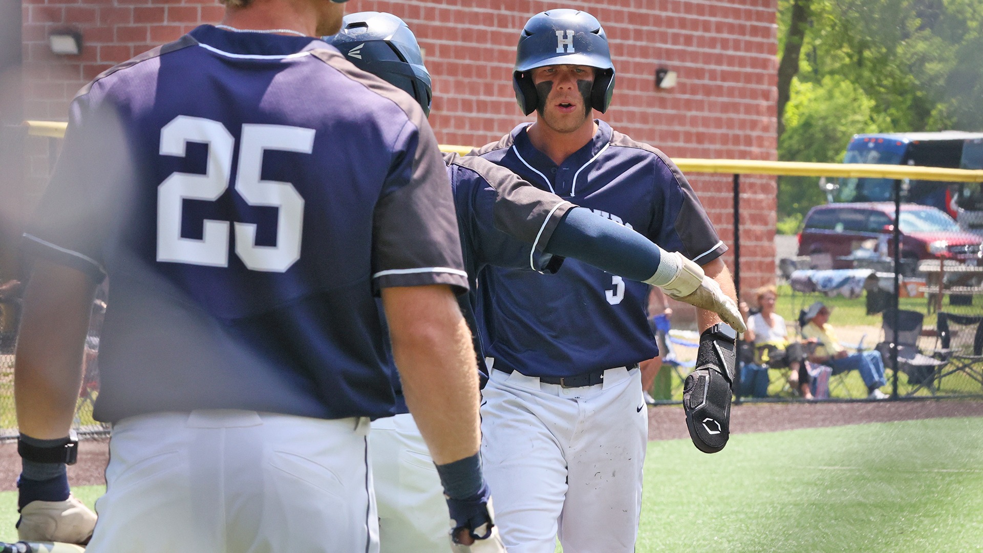 nathan lapp celebrates after scoring a run in an ncaa regional win over randolph-macon in 2026