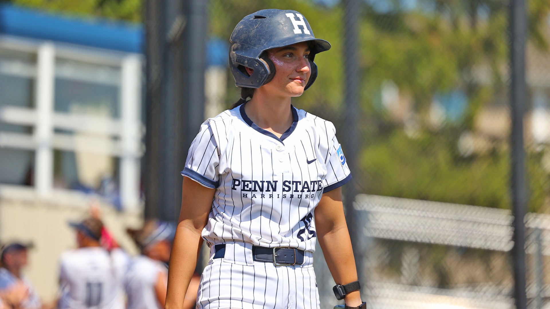 aspen walker smiles as she comes to the plate in a game against penn college in 2026
