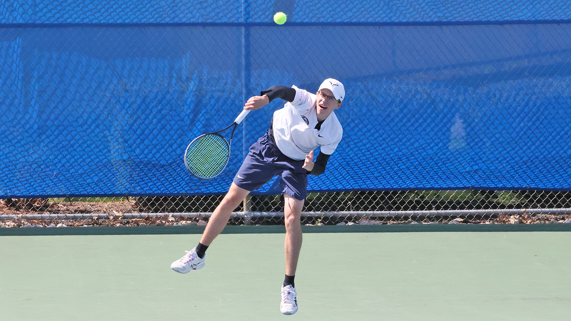 colin flack serves a ball in the united east championship match versus st marys