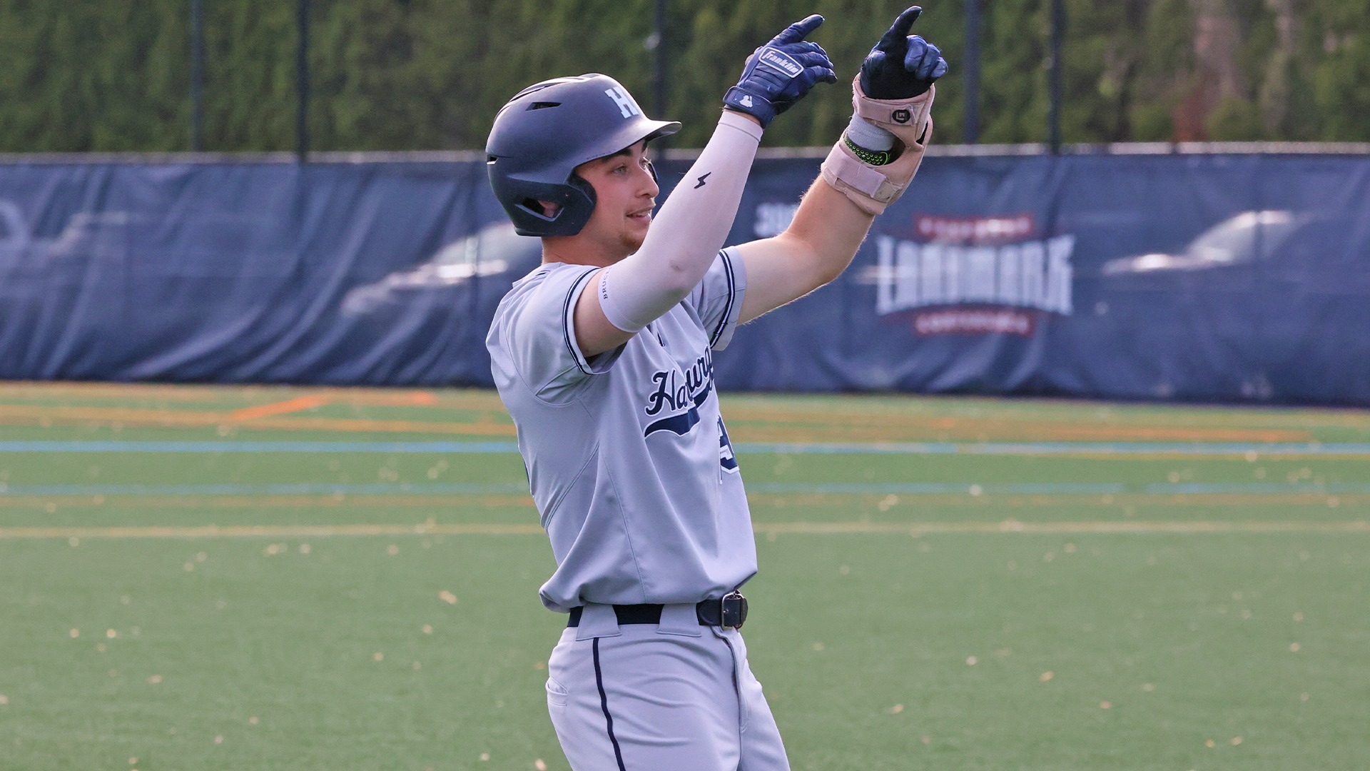 matthew johansen celebrates after beating out a bunt during a playoff win over lancaster bible in 2026