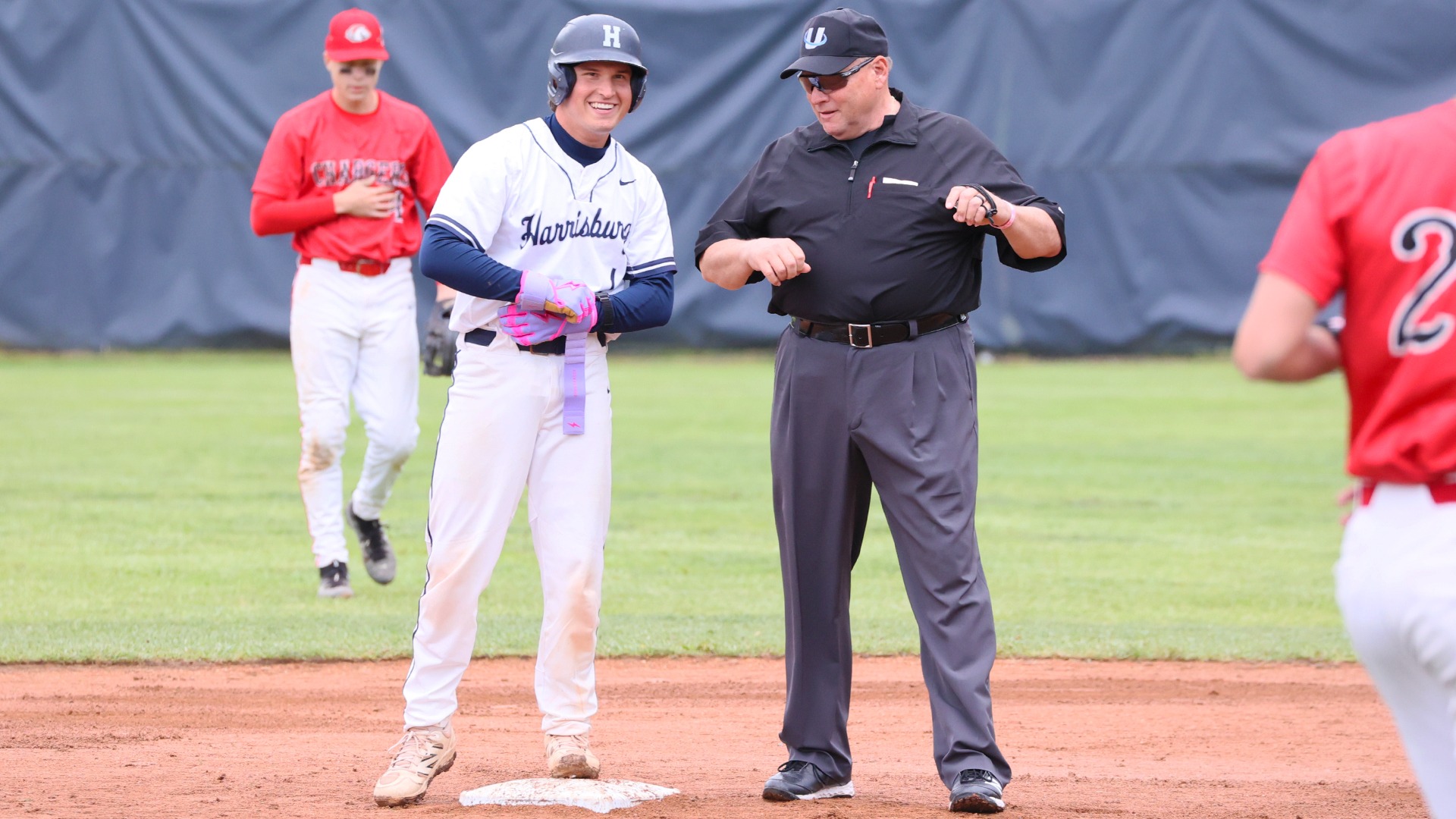 coy schwanger smiles at second base after hitting a double in a win over lancaster bible in the united east championship game in 2026