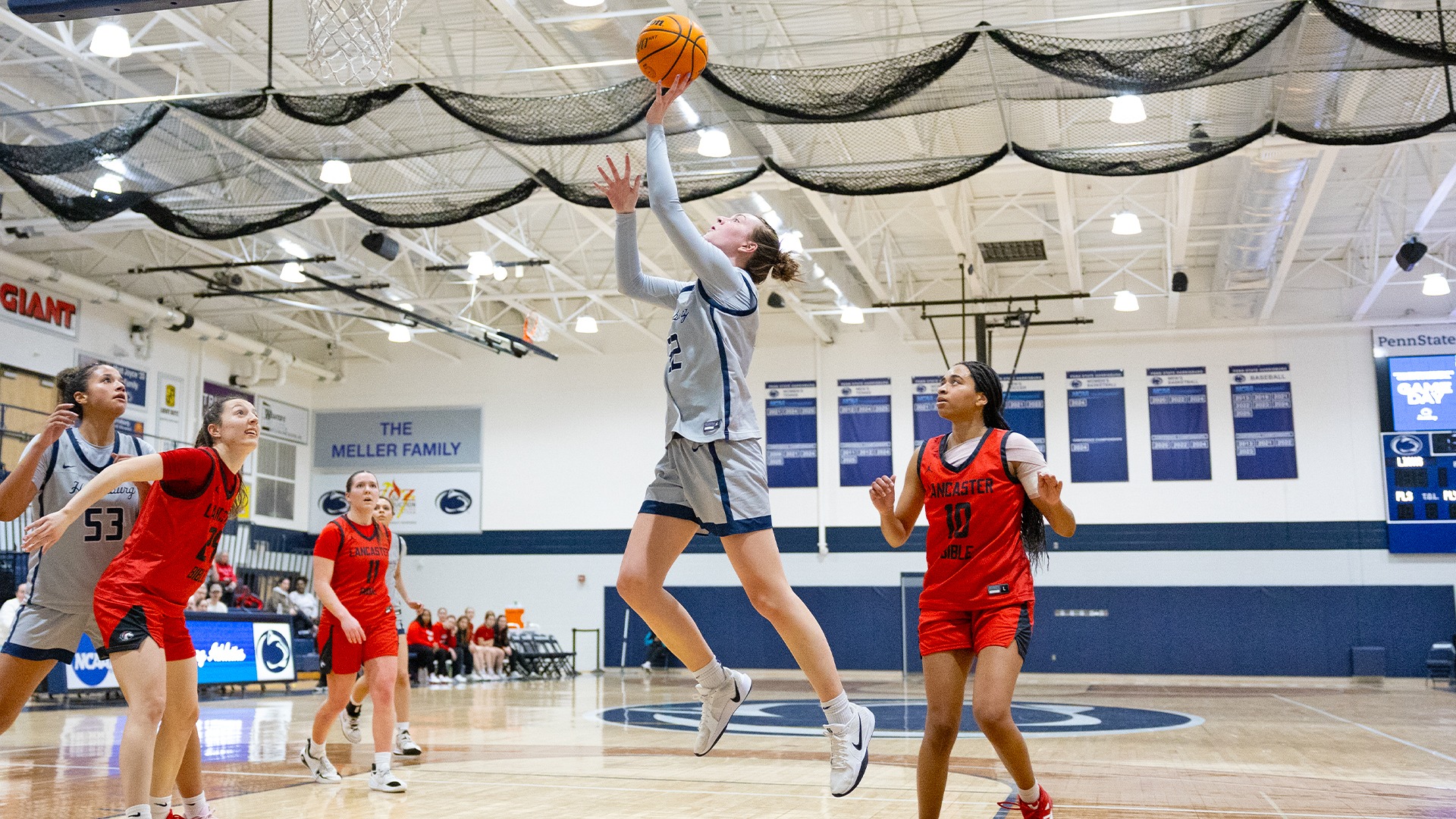lauren moffatt goes up for a left-handed layup during a game against lancaster bible in 2026