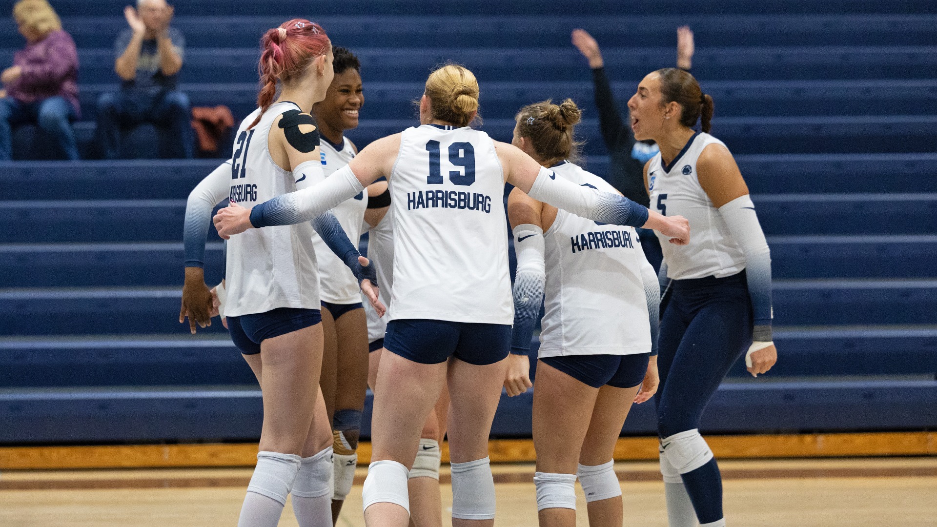 penn state harrisburg's women's volleyball team celebrates after scoring a point against marymount in 2026