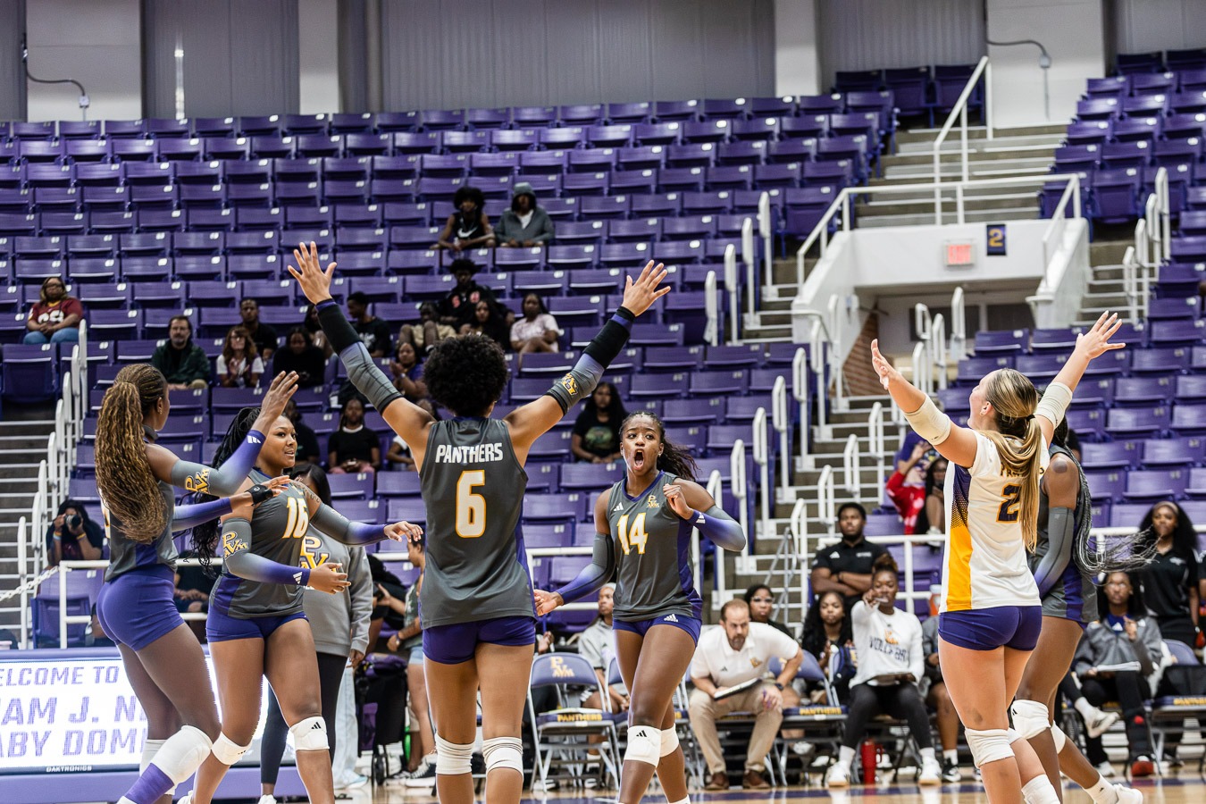 26 Volleyball Team celebrating 
