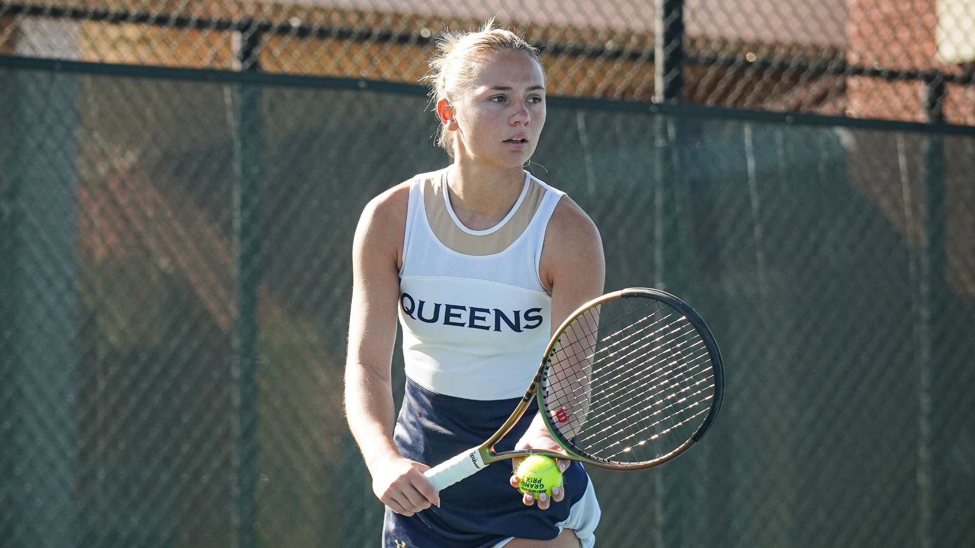 Zoe Cvitanovic preparing to serve