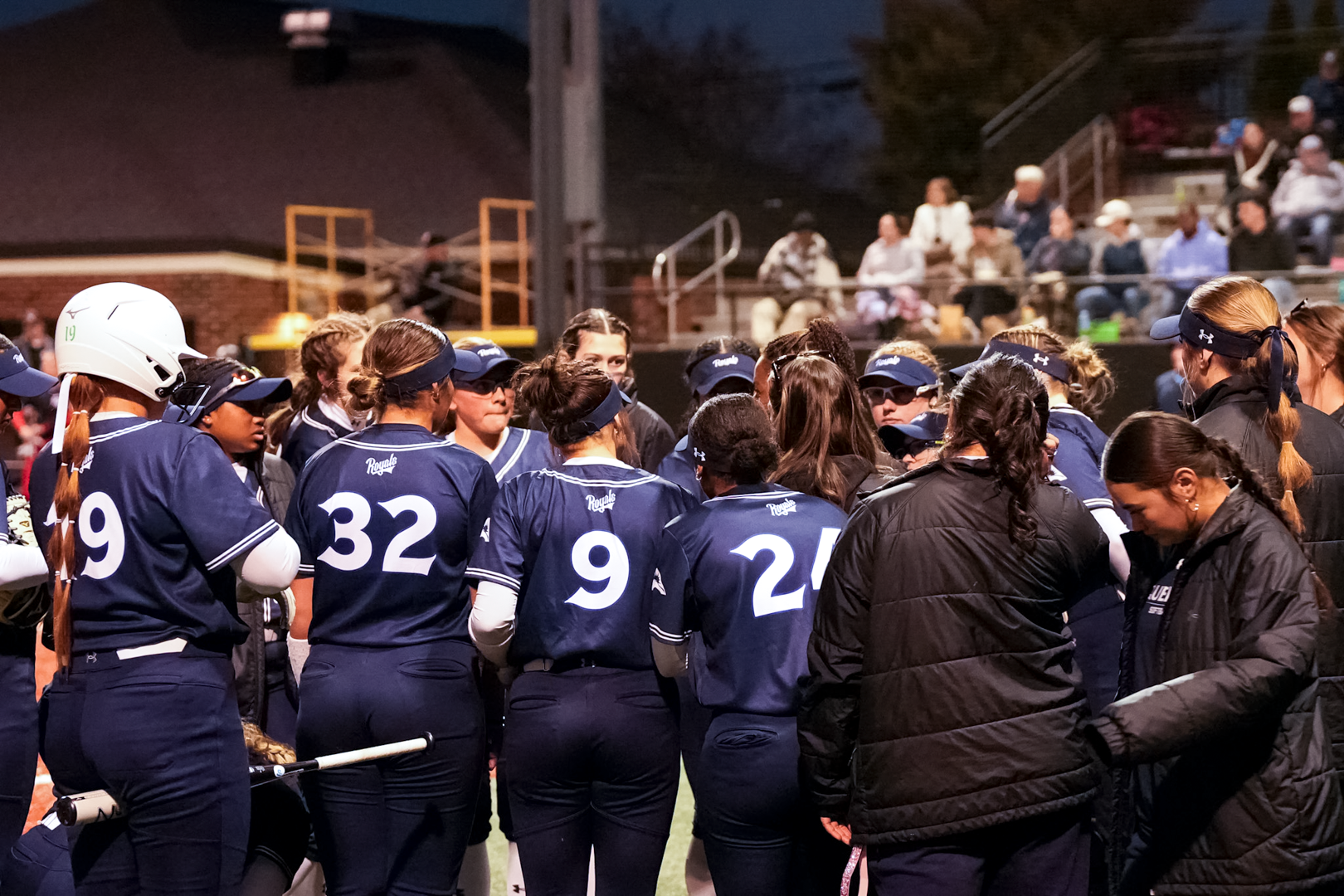 Team Huddle - Queens Softball