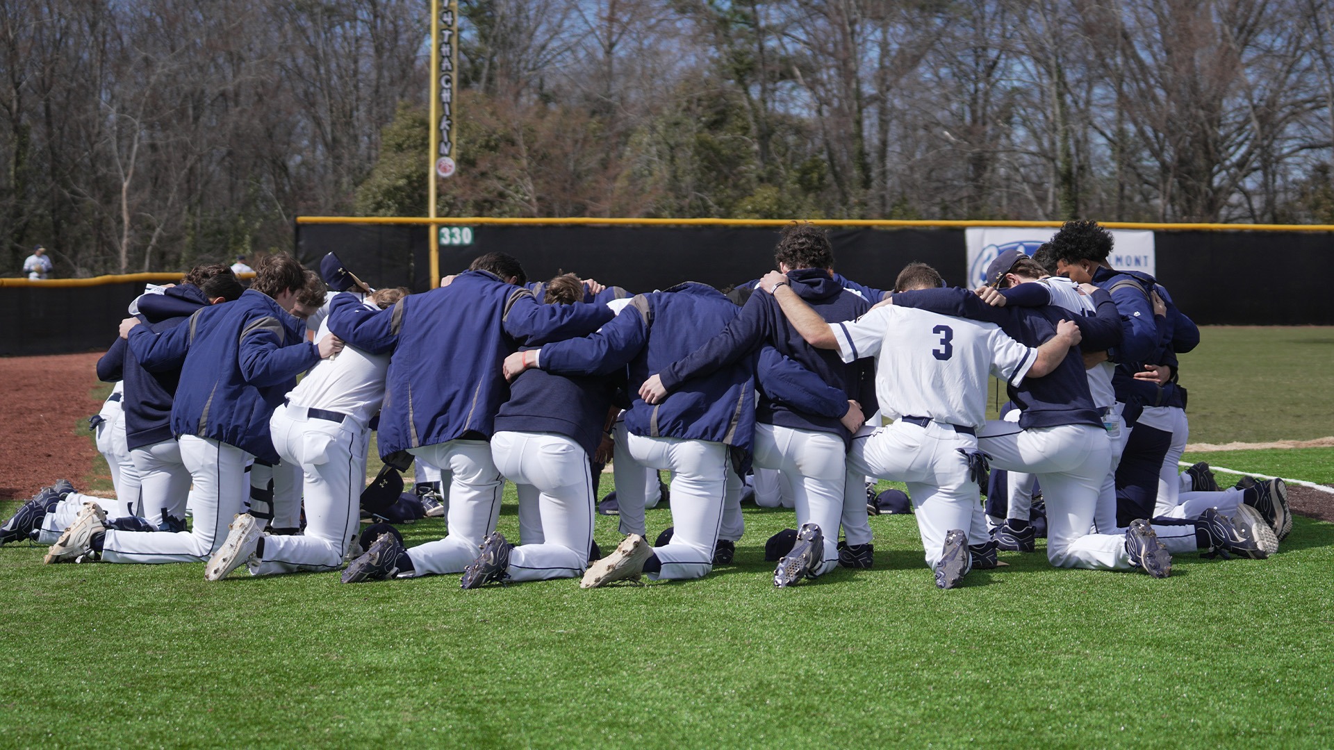 Baseball team huddle vs. NC A&T