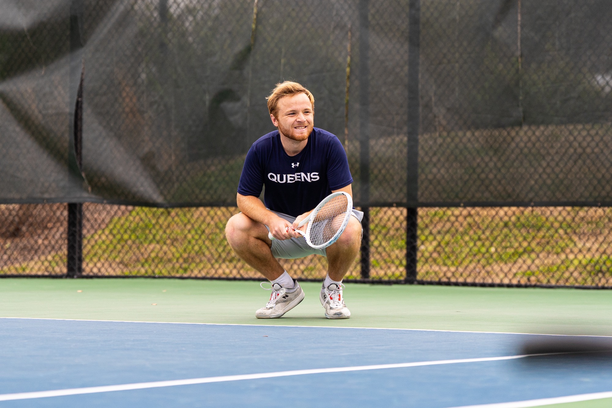 Alex Morris crouching