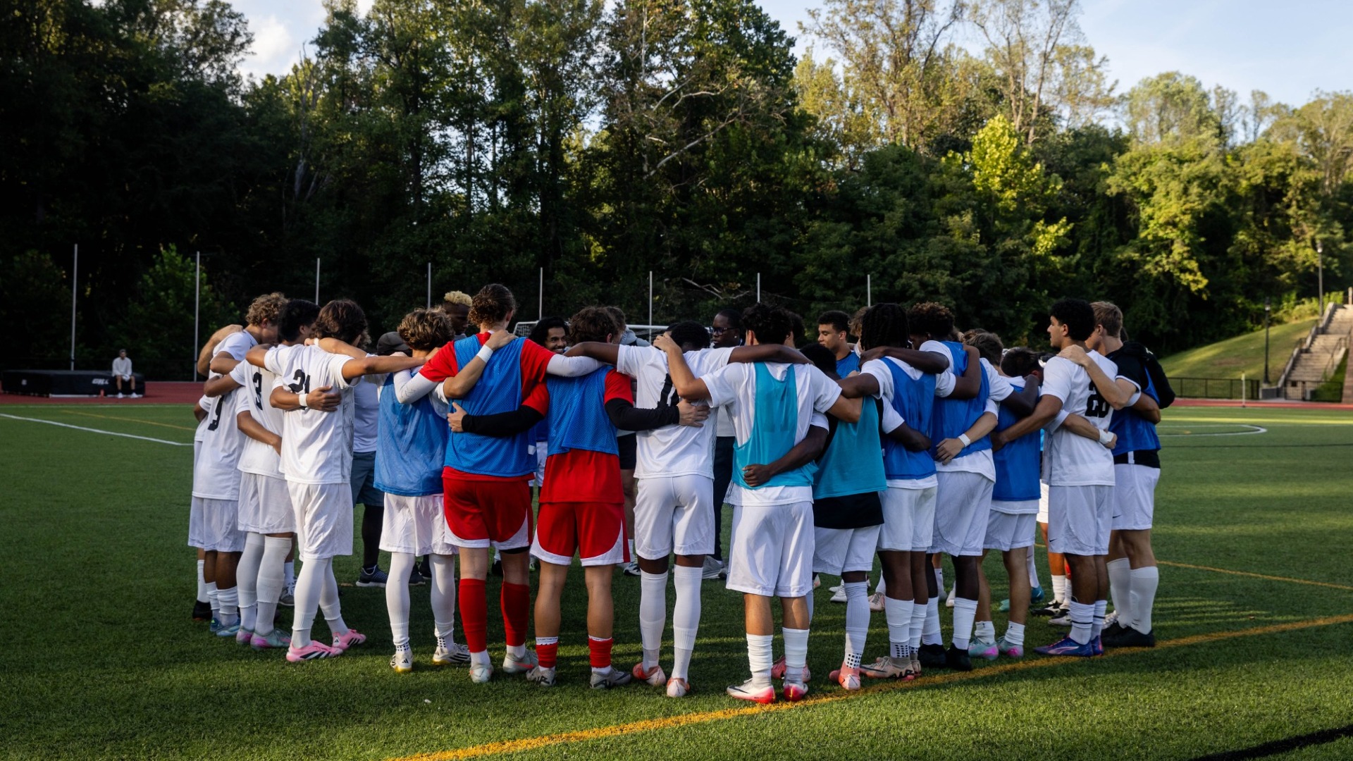 Men's Soccer huddle