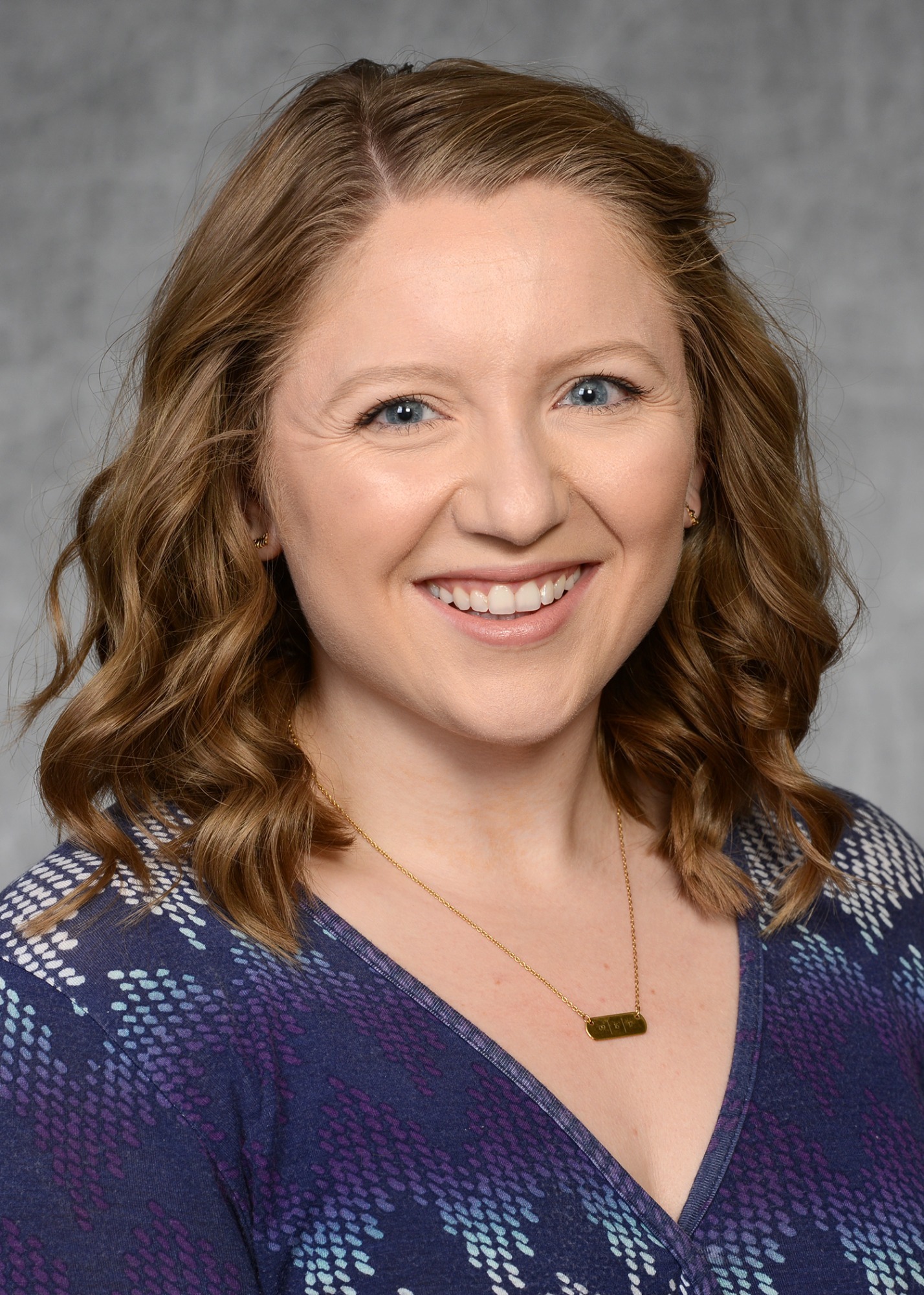 Liz Sapudar Headshot