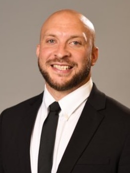Chad Duernberger Headshot Dartmouth Suit