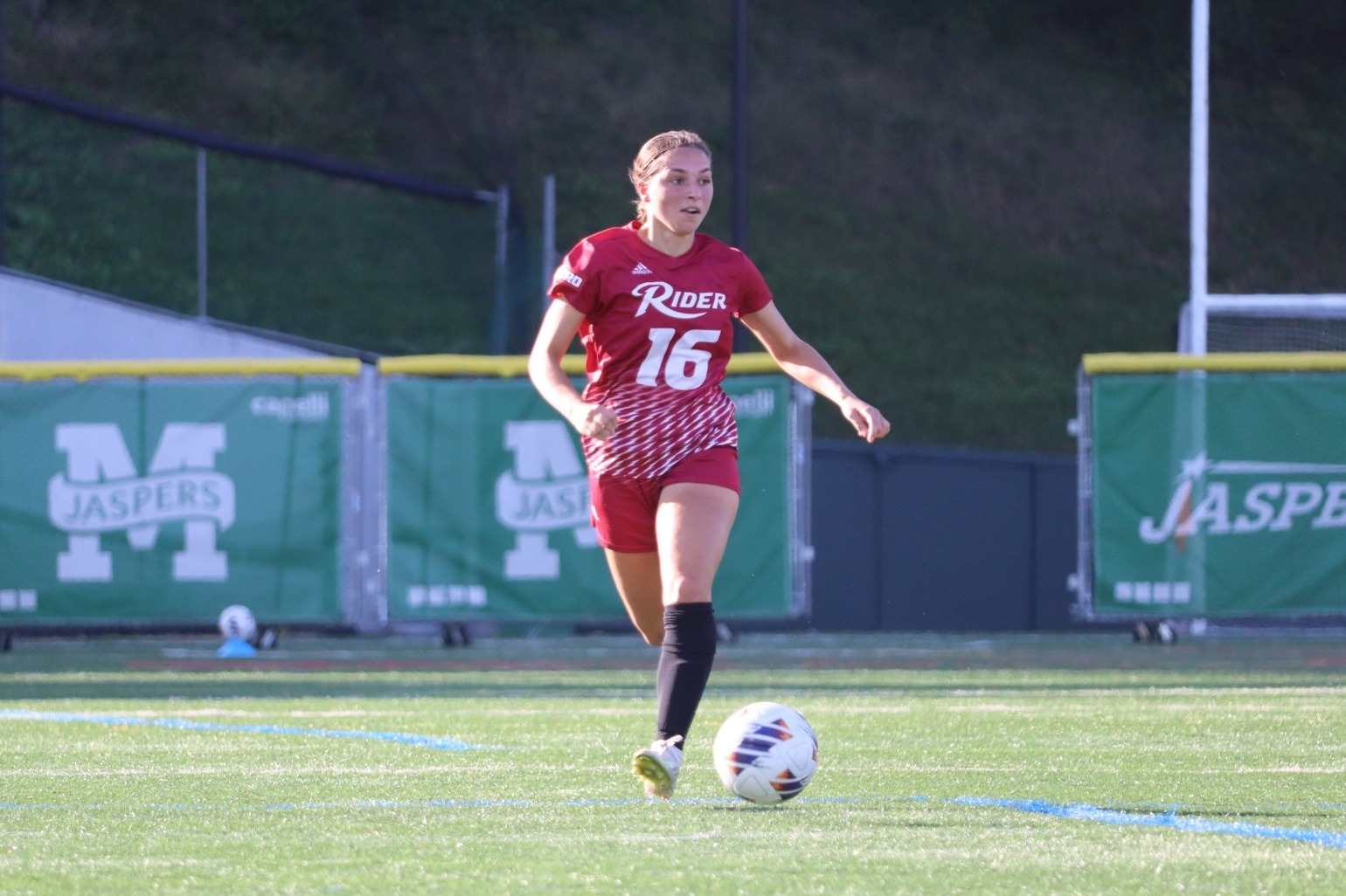 Ava Ferrie with the ball away at Manhattan 2026