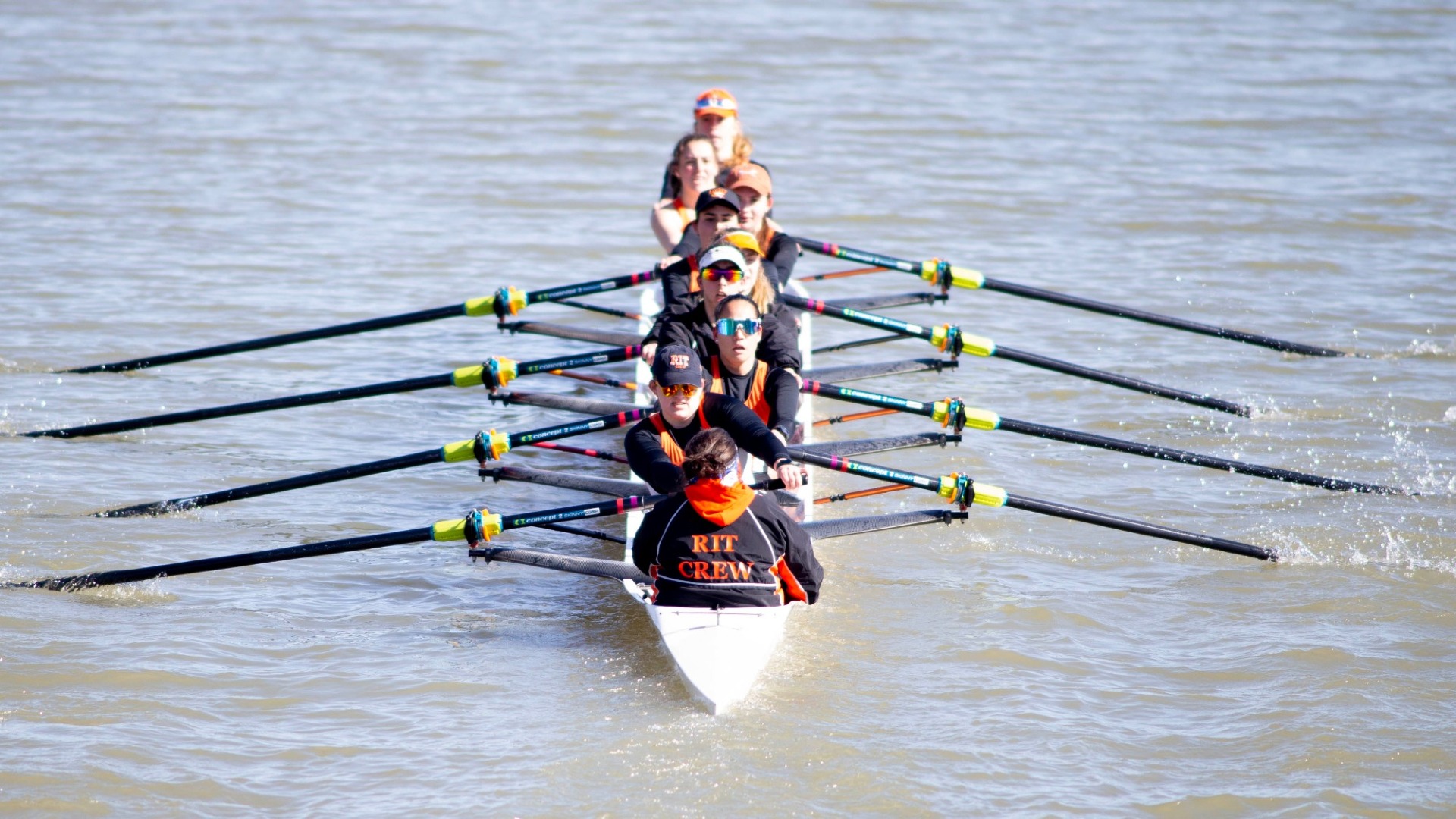 the RIT rowing women's team competes