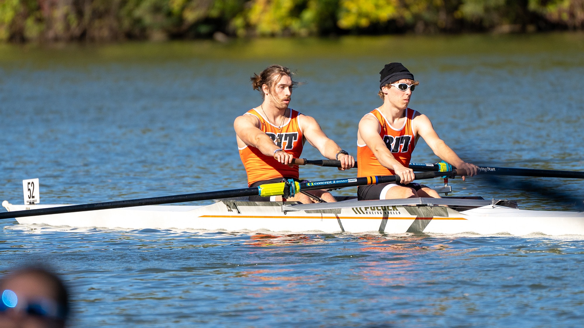 A pair of rowers competing for Rochester Institute of Technology on the Genesee River