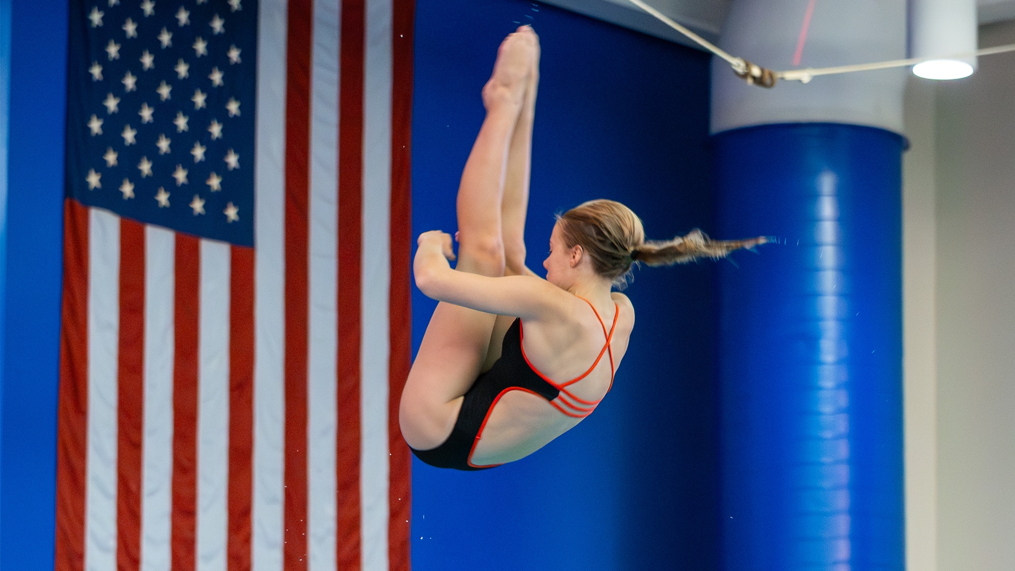 a women's diver for Rochester Institute of Technology making a dive in a dual meet against RPI on Saturday, October 11, 2025