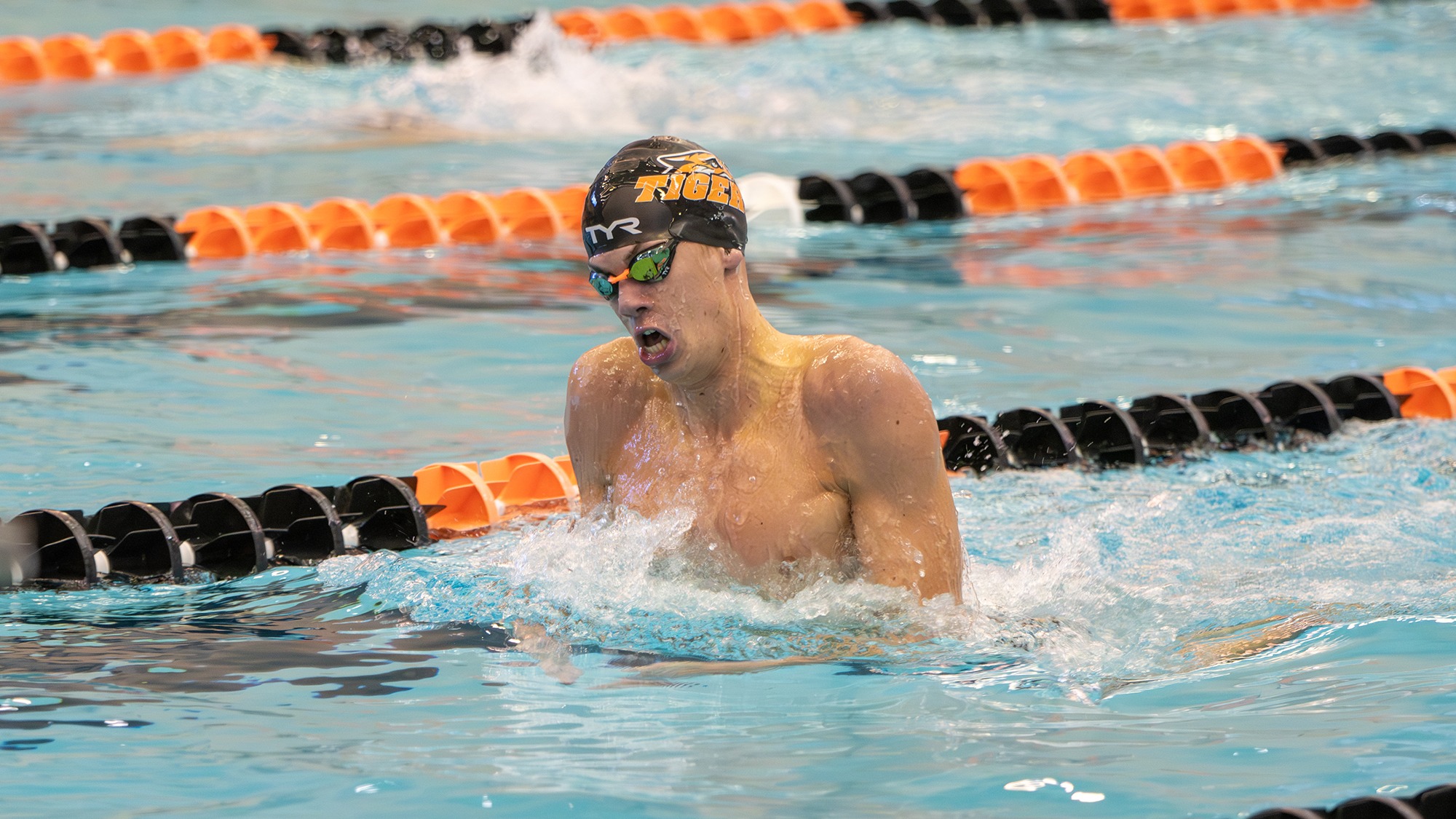 a men's swimmer competes in a race for Rochester Institute of Technology against RPI on Saturday, October 11, 2025