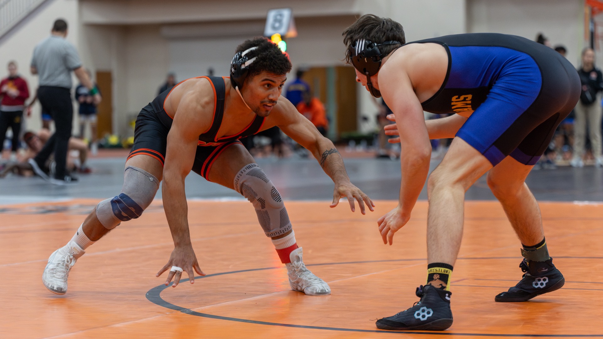 Max Watson gets ready to take down his opponent on Friday, Dec. 5, 2025, at Gordon Field House & Activities Center. RIT Wrestling Invitational. (Sophia Buonpane/RIT Sports Network