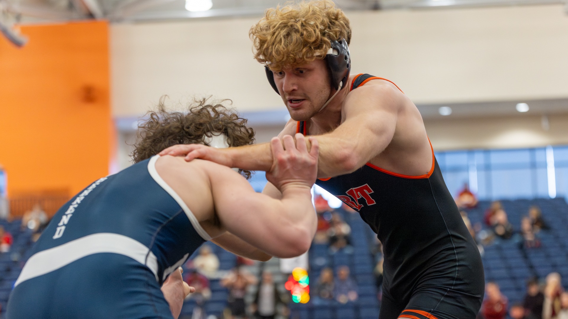 Mason Grodzki gets ready to take down his opponent on Friday, Dec. 5, 2025, at Gordon Field House & Activities Center. RIT Wrestling Invitational. (Sophia Buonpane/RIT Sports Network