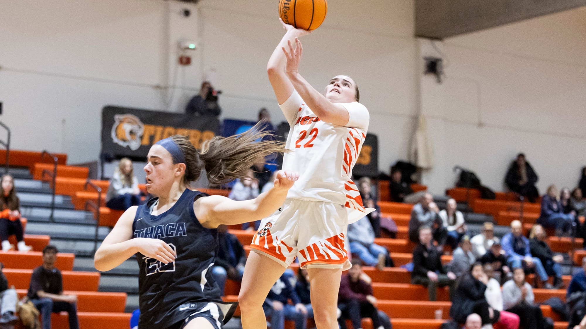 RIT's Maddy Ramsgard, #22, shoots a layup on Saturday, Jan. 31, 2026 at Clark Gym in Henrietta, N.Y. The RIT women’s basketball team played Ithaca College. 