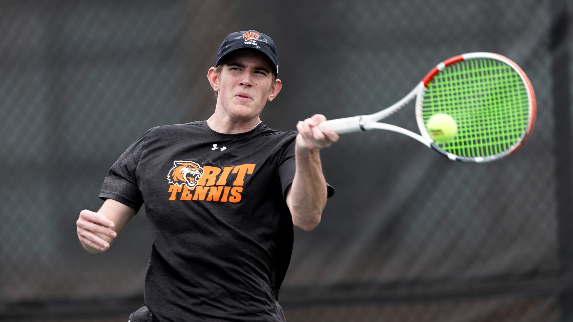 RIT’s Greg Sauer hits the ball on Saturday, April 18, 2026 at RIT Tennis Courts in Henrietta, N.Y. RIT men's tennis loses to Vassar men’s tennis 1-6. (Rebecca Villagracia/RIT Sports Network)