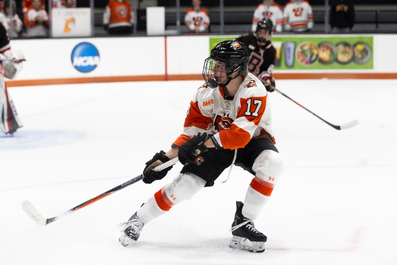 RIT's Ireland Stein, #17, skates for the puck on Saturday, Oct. 17, 2026, at Gene Polisseni Center. RIT Athletics / Chance Parker.