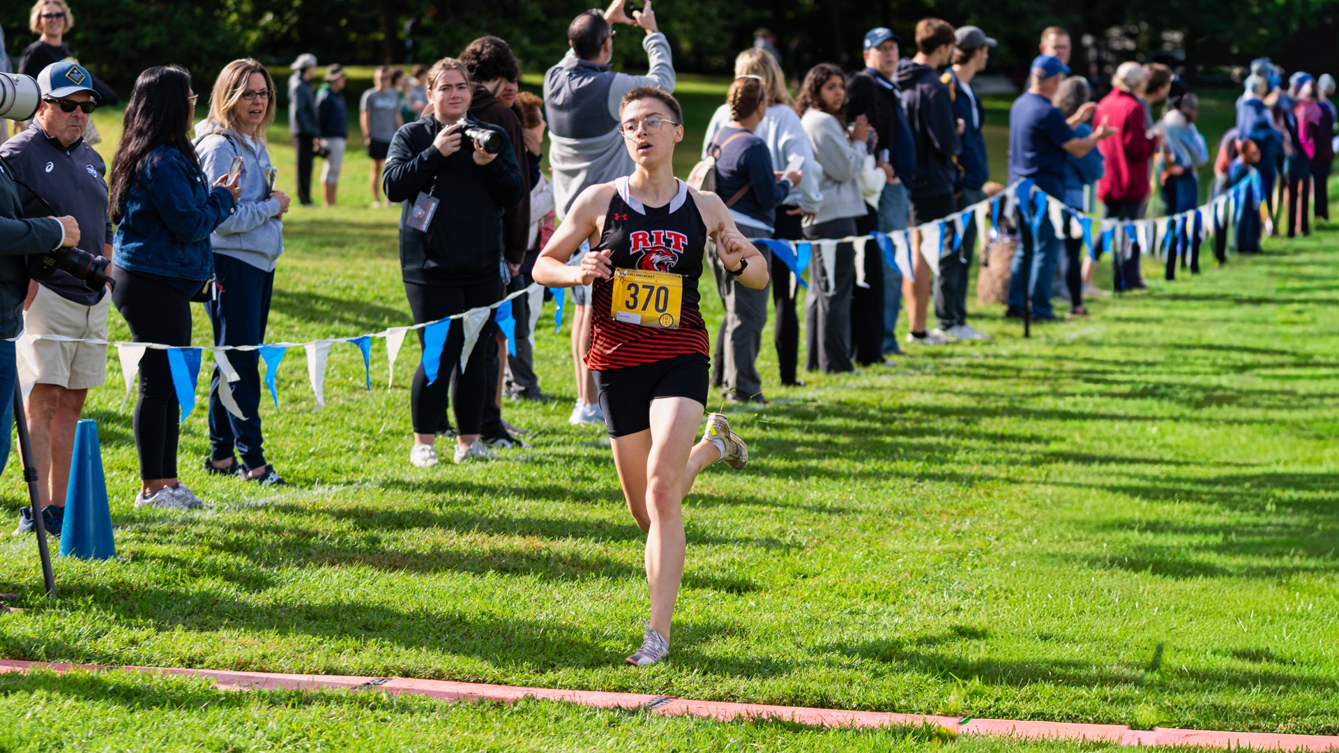 RIT’s Kathryn Arbegast runs to the finish line in a cross country race on Saturday, Sept. 19, 2026, at Genesee Valley Park. RIT Athletics / Cole Quinones.