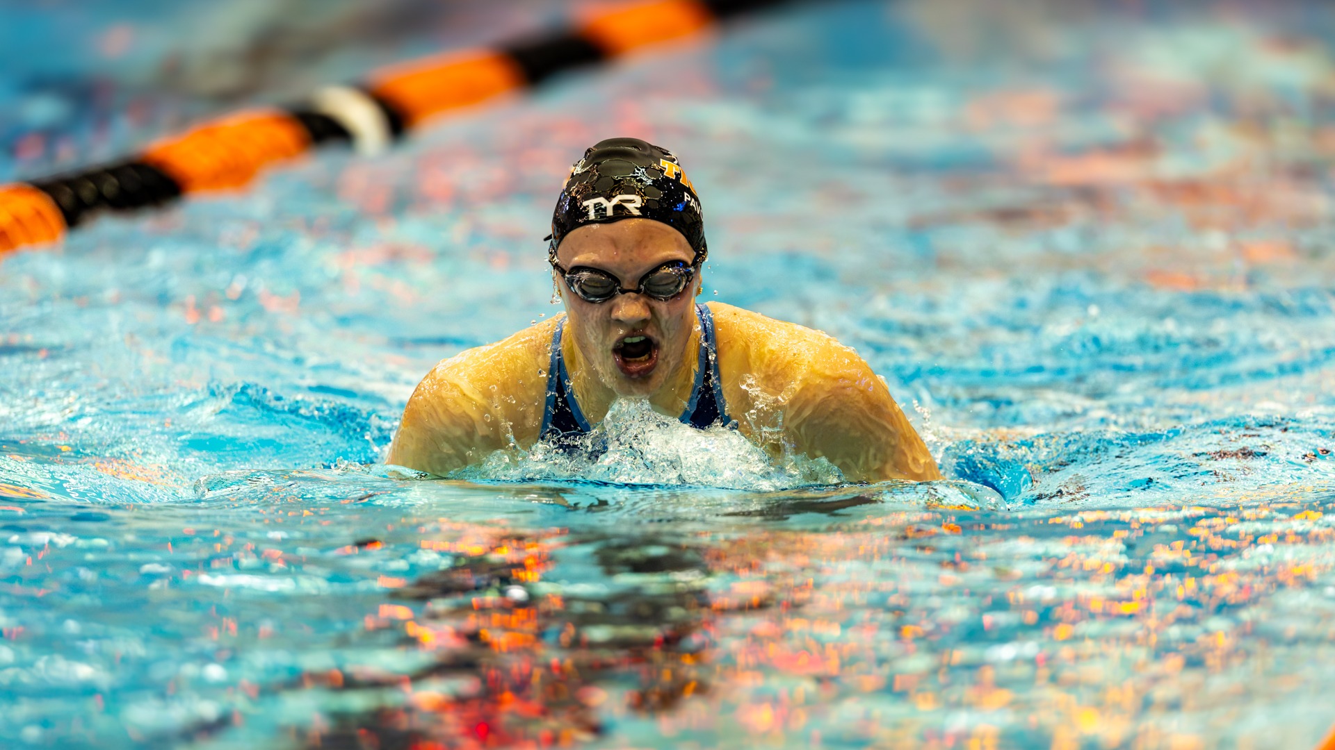 RIT’s Madisen Pavoris, in the butterfly on Friday, Oct. 23, 2026, at Judson/Hale Aquatics Center. RIT Athletics / Cole Quinones.