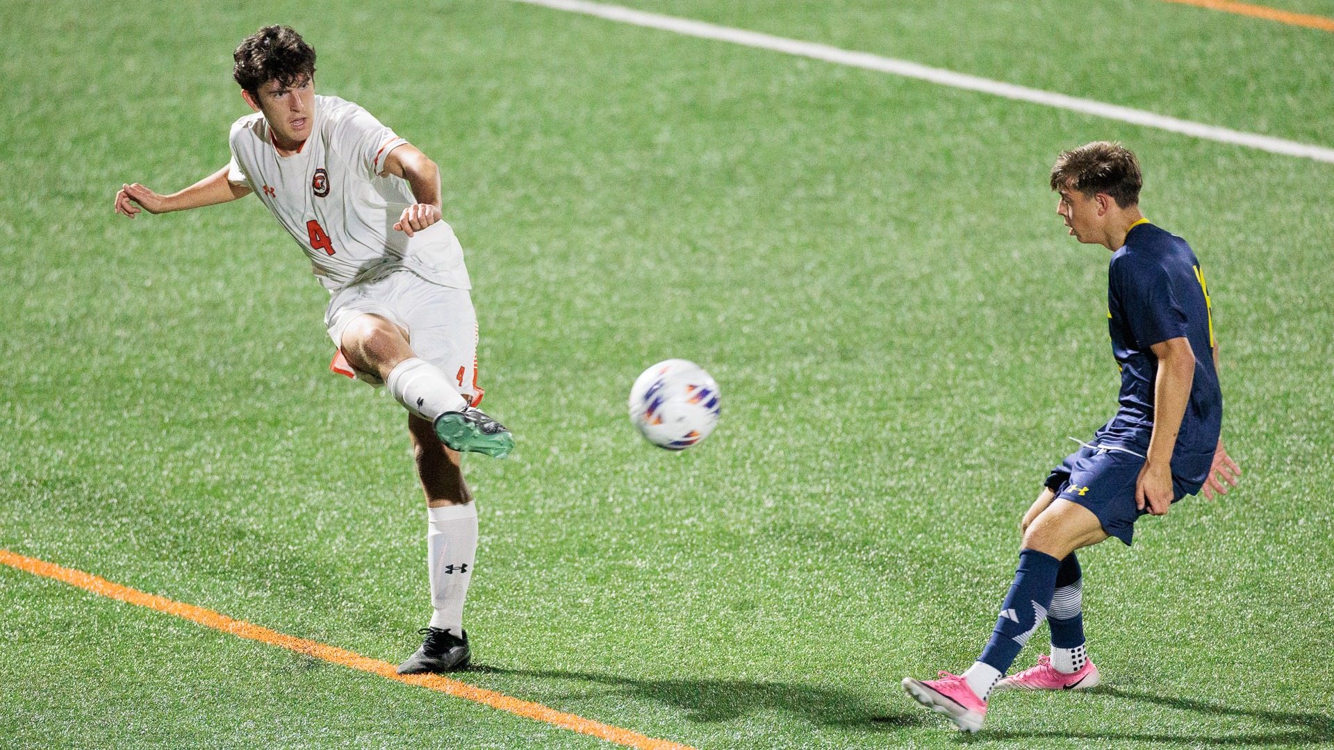RIT's Sean Irvin, #4, kicks the ball down field during a match against the University of Rochester on Wednesday, Oct. 7, 2026, at Thomas Fearey Judson Jr. Stadium. RIT Athletics / Colin Norland.