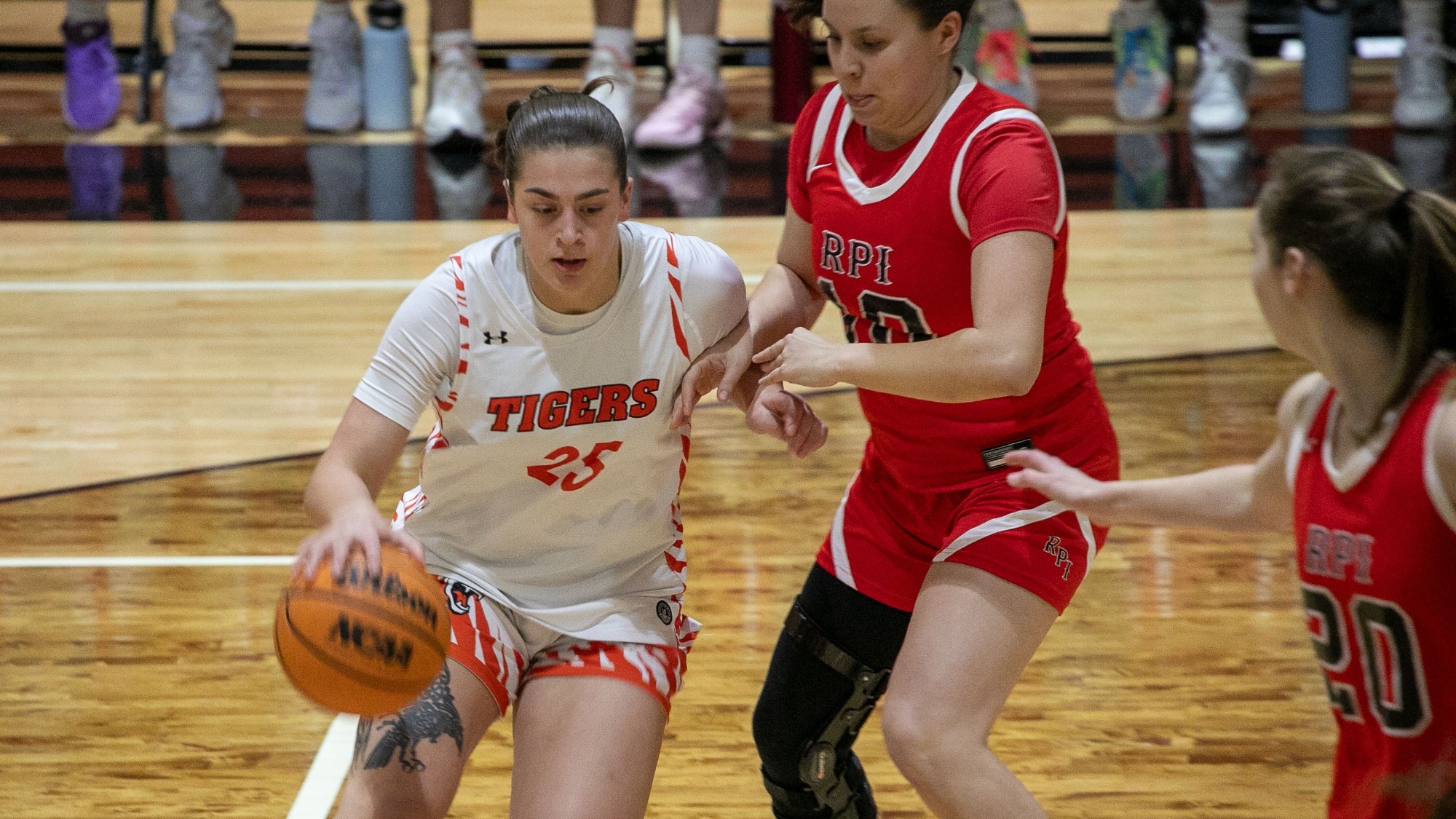 RIT's Faye Kaplinski, #25, dribbles around an opponent on Saturday, Jan. 17, 2026, at George H. Clark Gymnasium. RIT Women’s Basketball game vs RPI. 