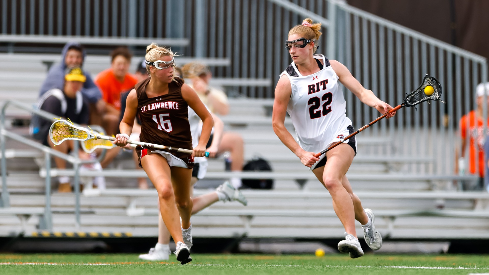 RIT's Adele Jones, #22, runs down the field with the ball in Liberty League game vs St. Lawrence University on Tuesday, April 29, 2025, at . RIT Women's Lacrosse game vs. St. Lawrence. (Mikaela Engstrom/RIT Sports Network).