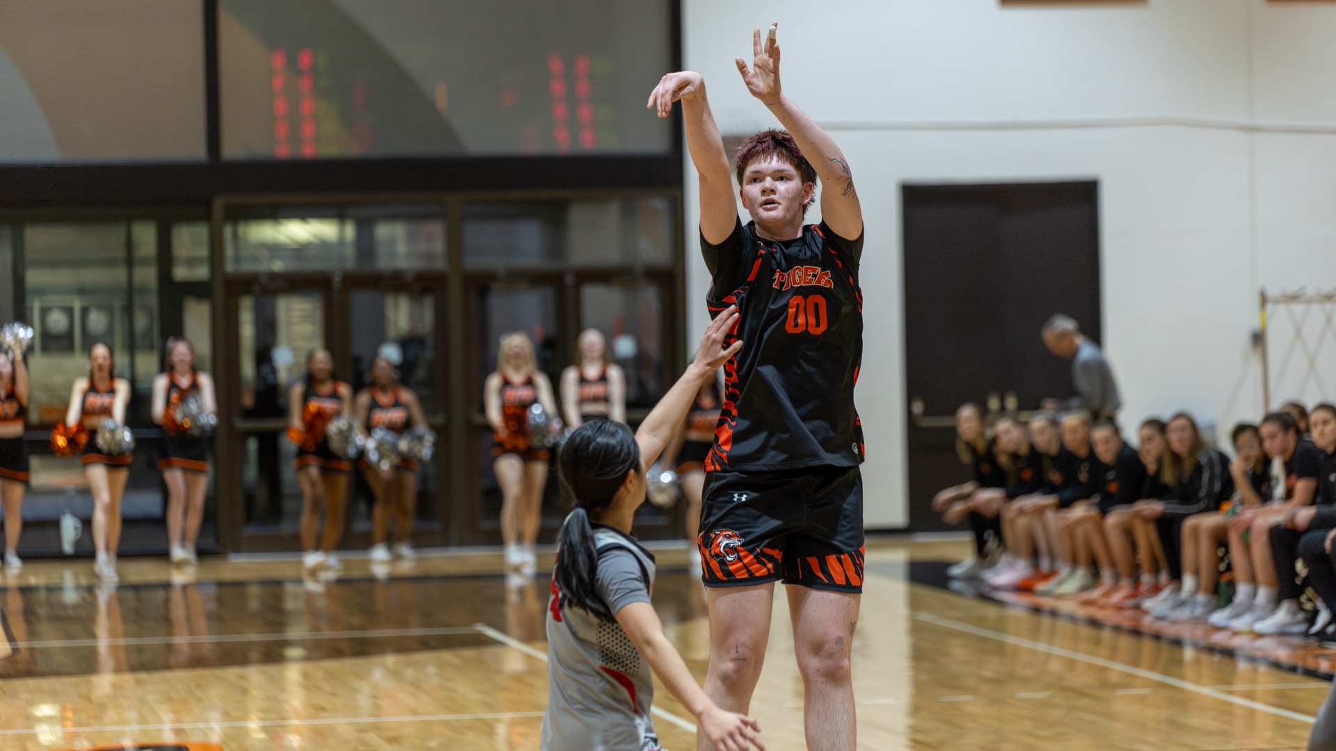 RIT’s Ben Kayser-Cochran, #00, shoots and scores two points on Friday, Feb. 20, 2026, at George H. Clark Gymnasium. RIT Womens Basketball Game vs. Bard.