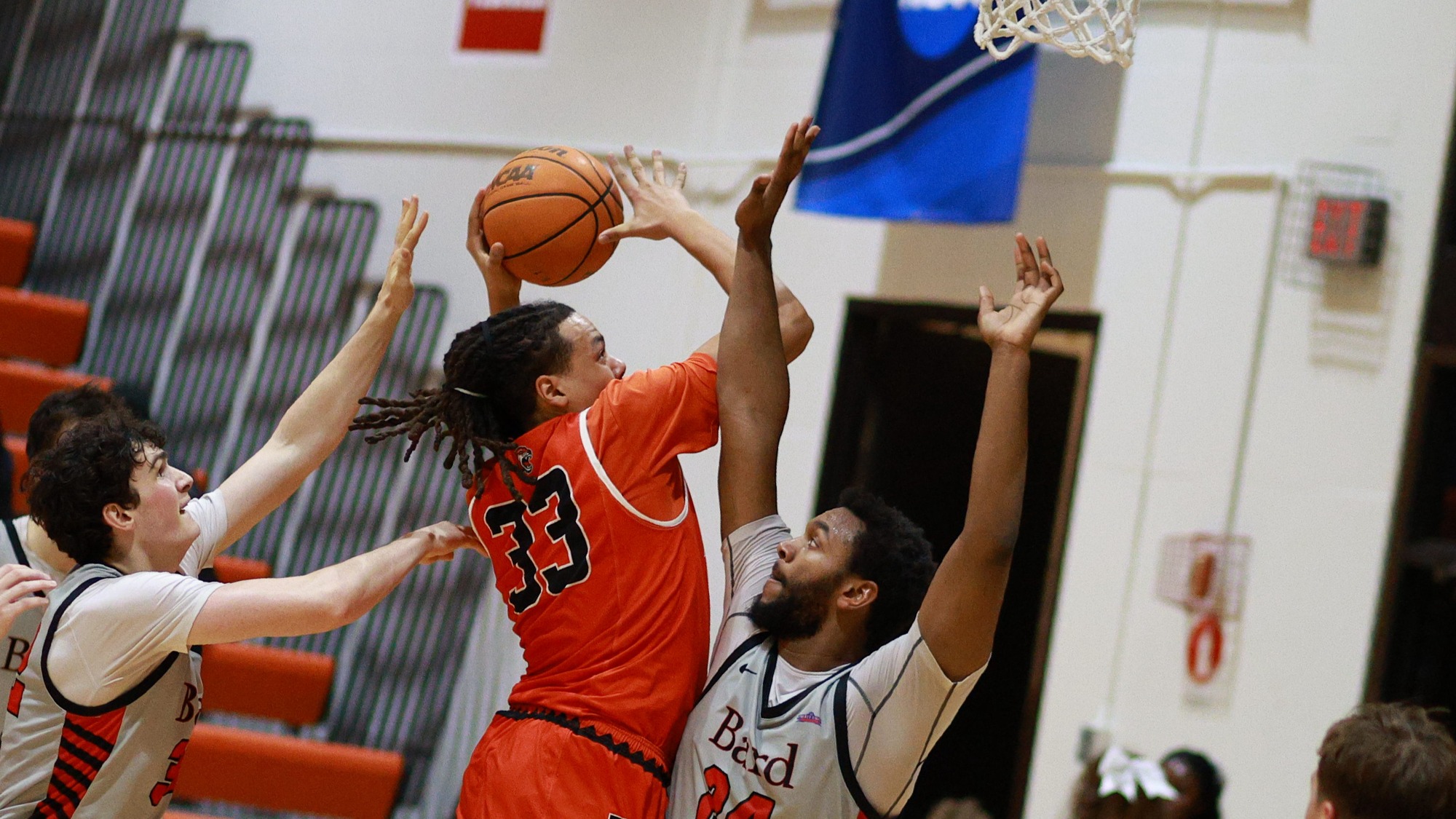 RIT's Josiah Turner, #33, goes up for a layup on Feb. 20, 2026, at Clark Gymnasium in Rochester, N.Y. RIT Men’s Basketball defeats Bard Men’s Basketball 73-64. RIT Men’s Basketball vs Bard. 