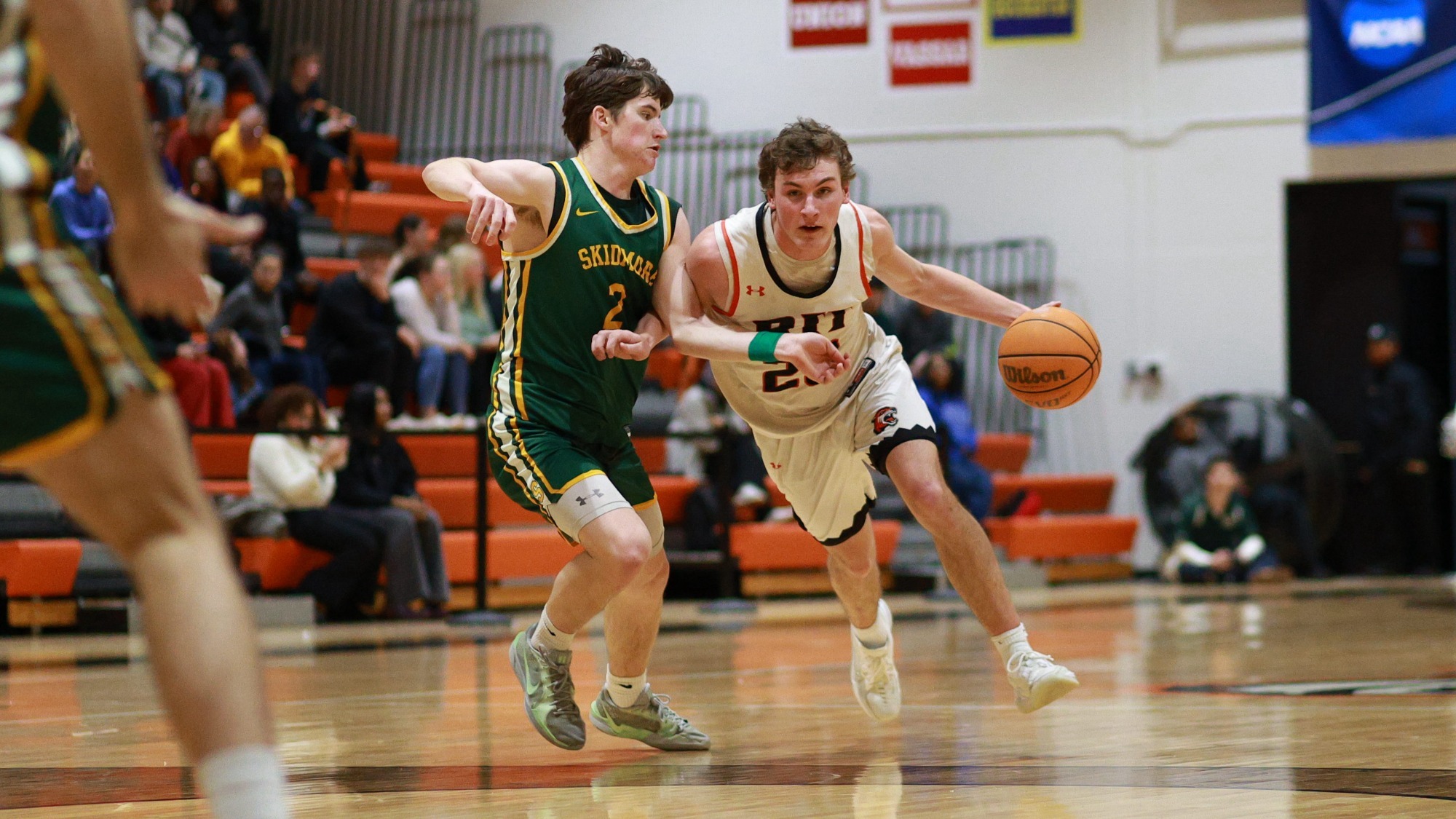 RIT's Zac Ditzel, #20, dribbles the ball on Feb. 21, 2026, at Clark Gymnasium in Rochester, N.Y. RIT Men’s Basketball defeats Skidmore Men’s Basketball 57-55. RIT Men’s Basketball vs Skidmore. (Sawyer Emery/RIT Sports Network).