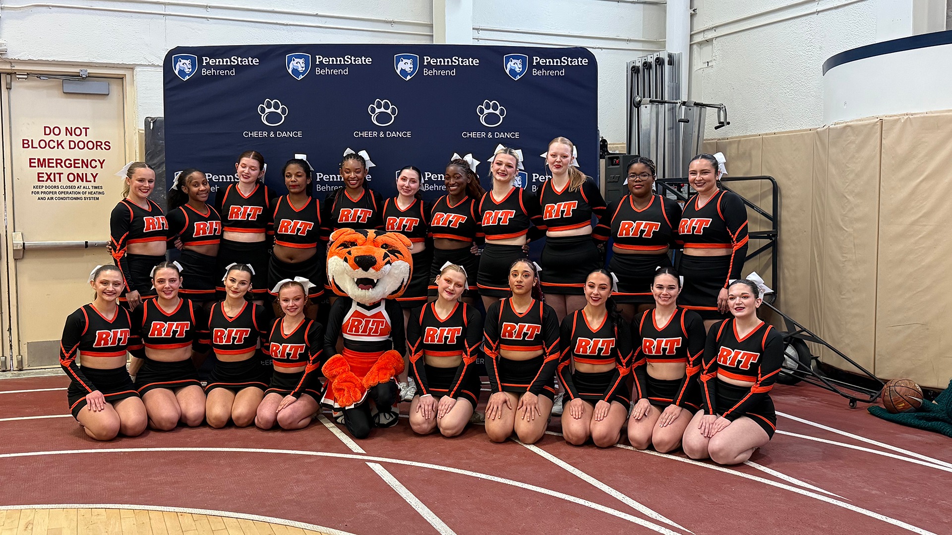 A photo of the RIT Cheer Team at the Penn State Behrend competition