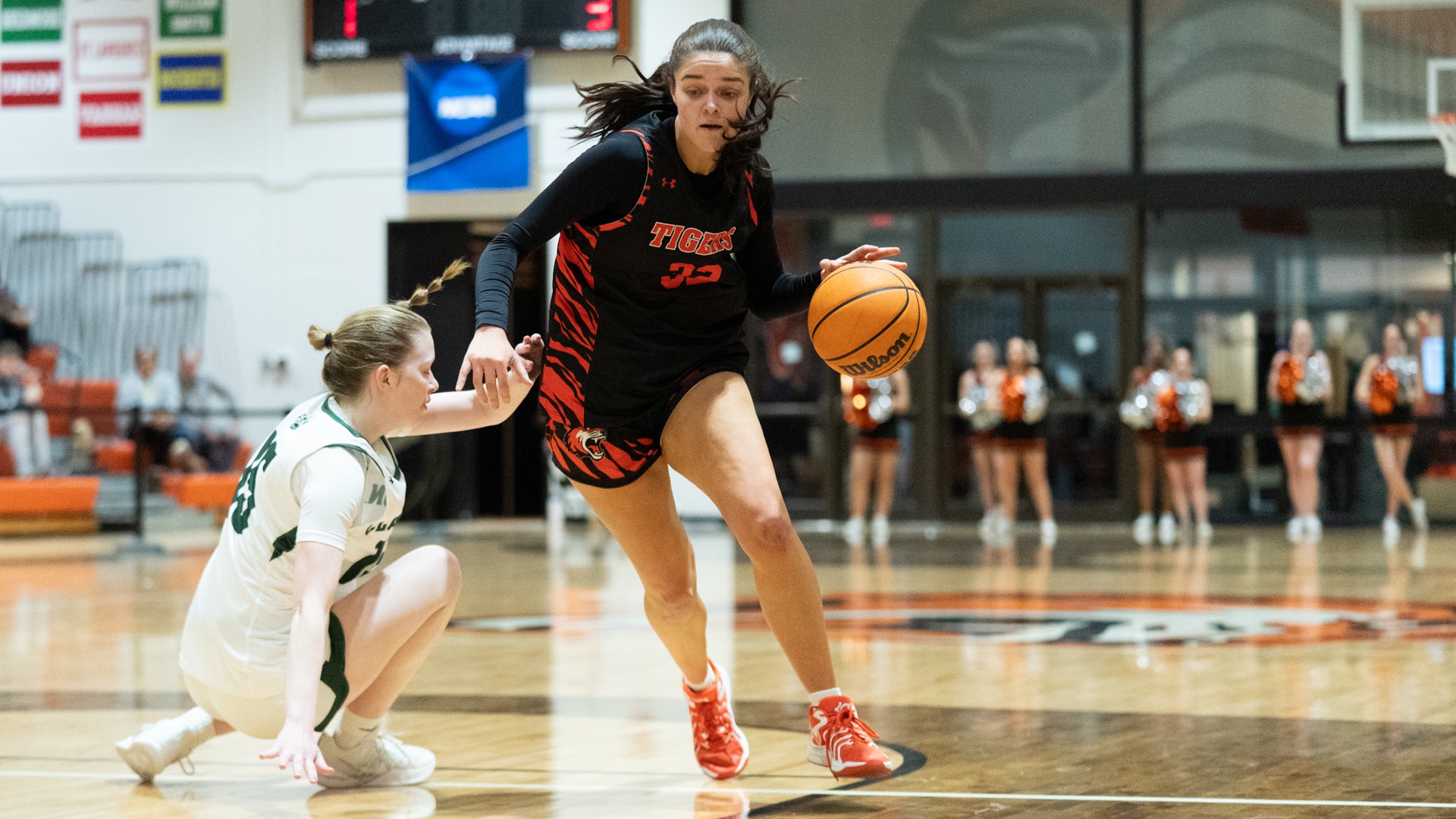 RIT's Sydney Pearson, dribbles the ball up the court past a defender on February 6th, 2026, at Clark Gymnasium in Henrietta, New York. RIT Women’s Basketball defeats Clarkson University 87-54. 