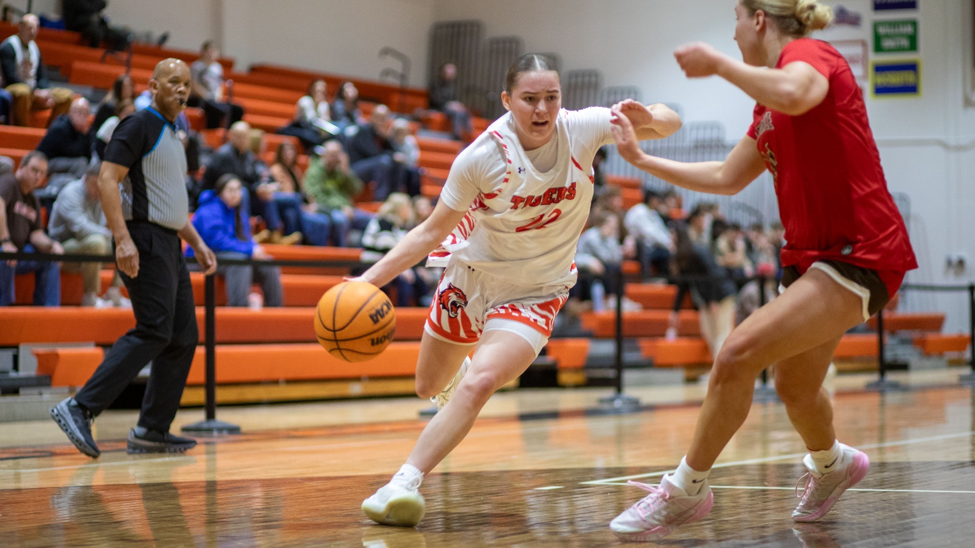 A players dribbles past a defender in a RIT Women’s Basketball game vs SLU on Saturday, Feb. 7, 2026, at George H. Clark Gymnasium. (RIT Athletics / Caitlyn Daproza). 