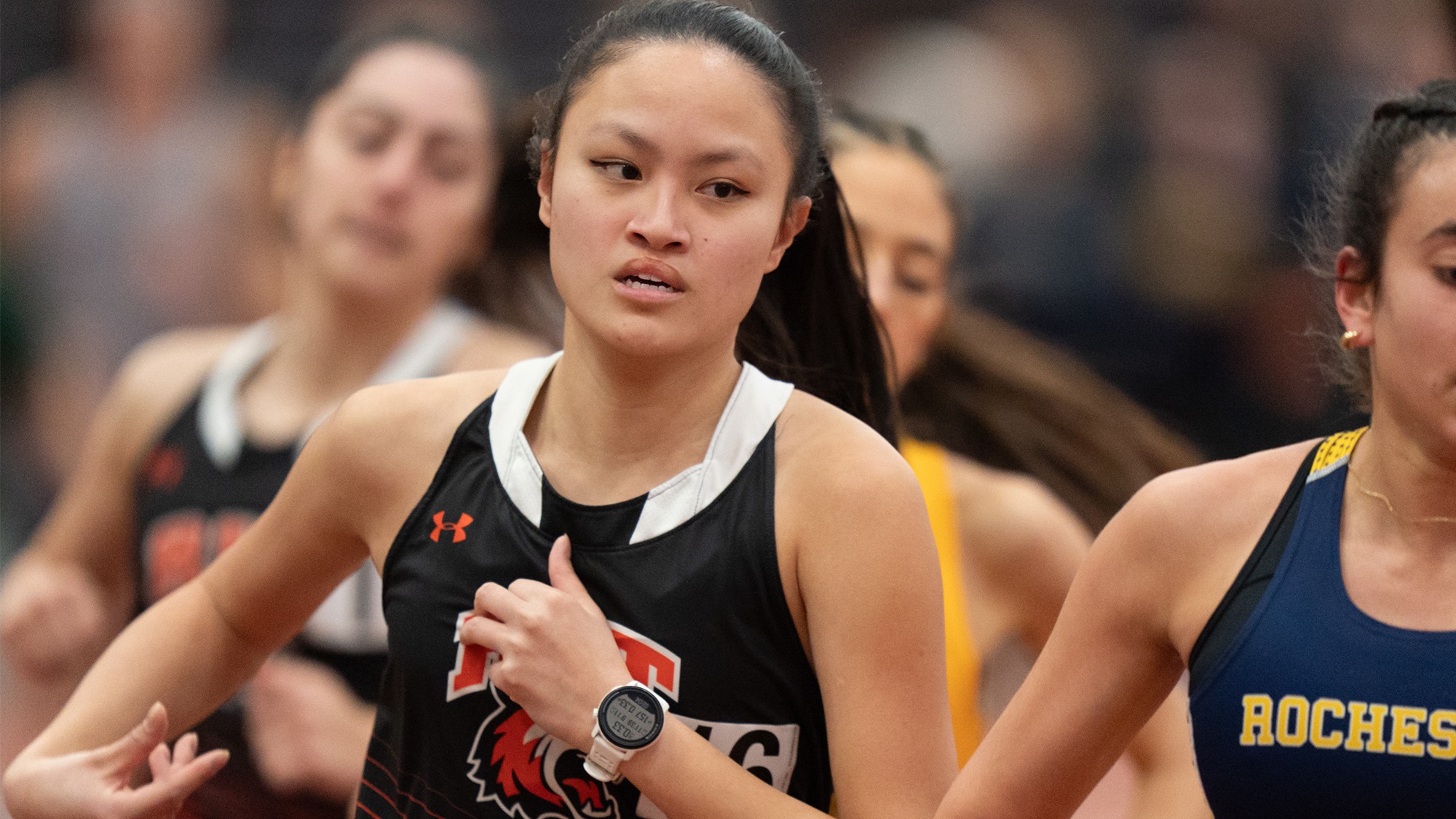 An RIT runner runs to the finish line on January 23rd, 2026, at Gordon Field House in Henrietta, New York. RIT Track and Field competes at the RIT Invite at home. (Colin Norland/RIT Sports Network).