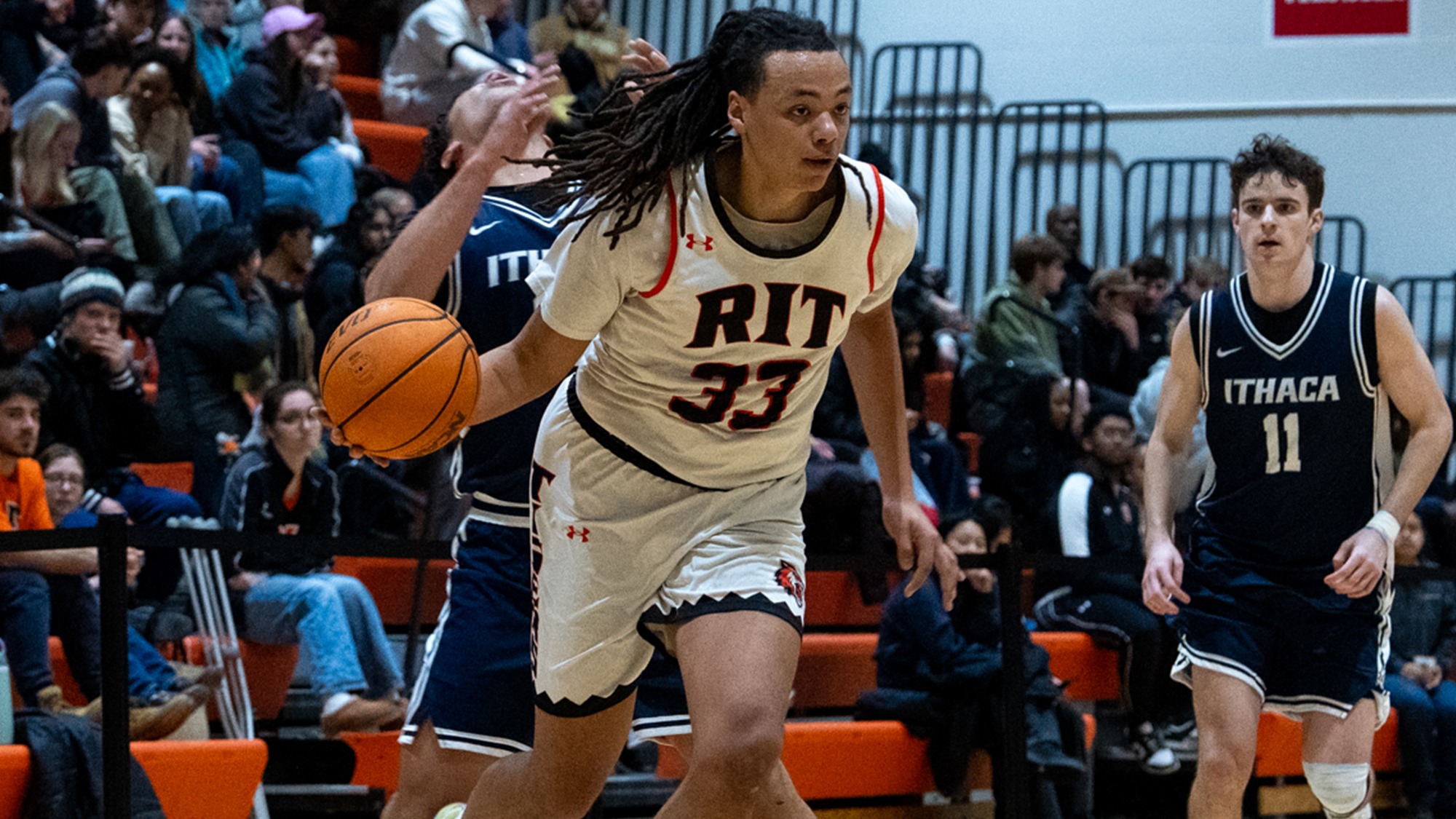 RIT's Josiah Turner, #33, dribbles the ball during the RIT Men’s Basketball game against Ithaca on Saturday, Jan. 31, 2026, at the George H Clark Gymnasium. RIT Men’s Basketball vs Ithaca. (Natasha Kaiser/RIT Sports Network).