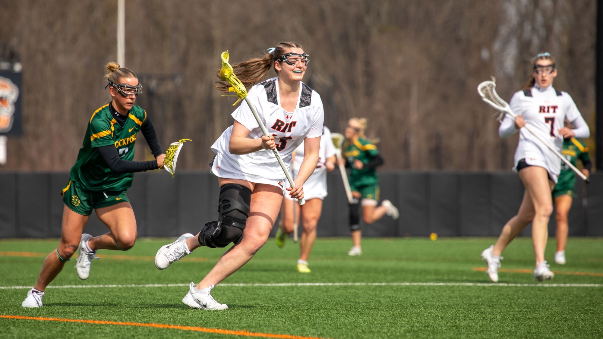 RIT’s Emma Ripley, #13, runs with the ball on Saturday, Feb. 28, 2026, at Tiger Stadium. RIT Women’s Lacrosse game vs Brockport. (RIT Athletics / Caitlyn Daproza).