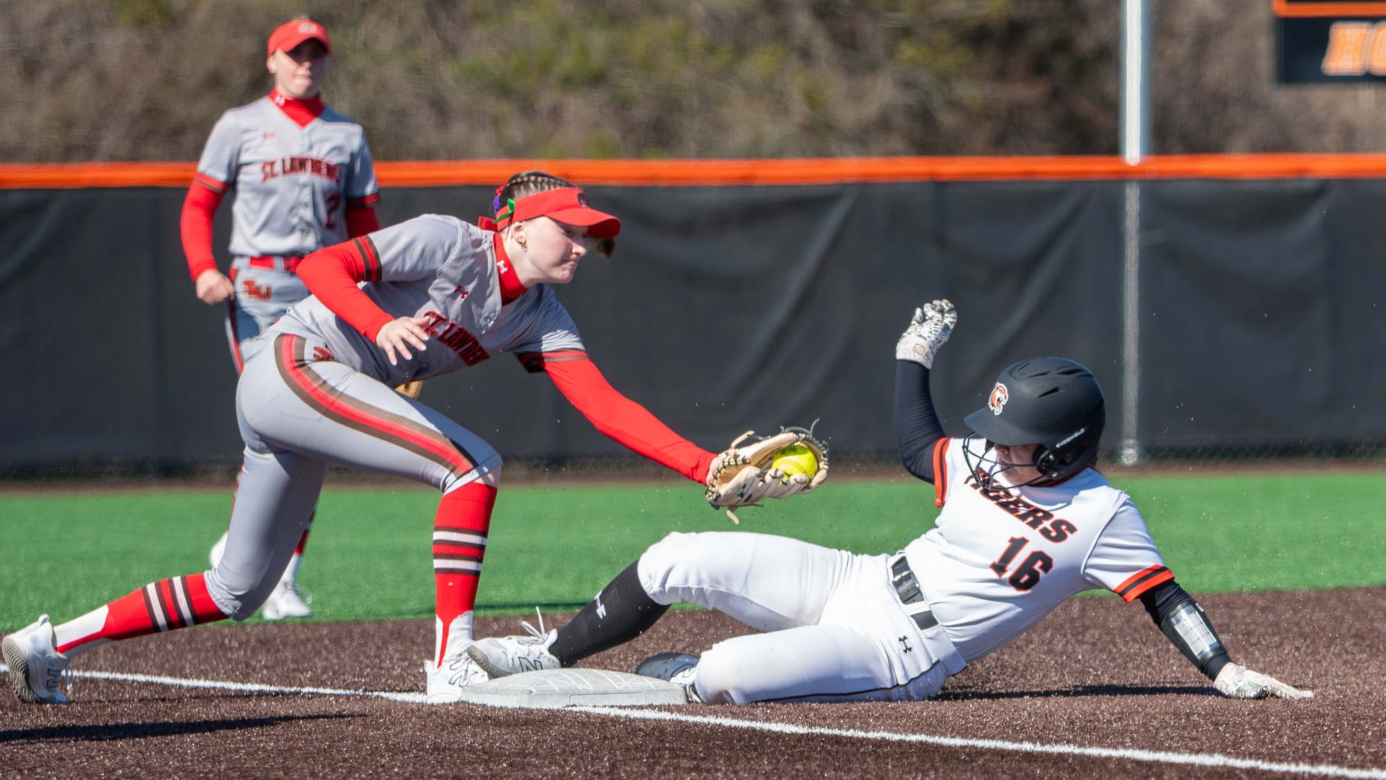 RIT's Sabrina Hotra, #16, slid into third base to avoid a tag during game against St. Lawrence University on Saturday, April 11, 2026, at Rochester Institute of Technology . RIT Softball vs. St. Lawrence University. (Elizabeth Robertson/RITAthletics) 
