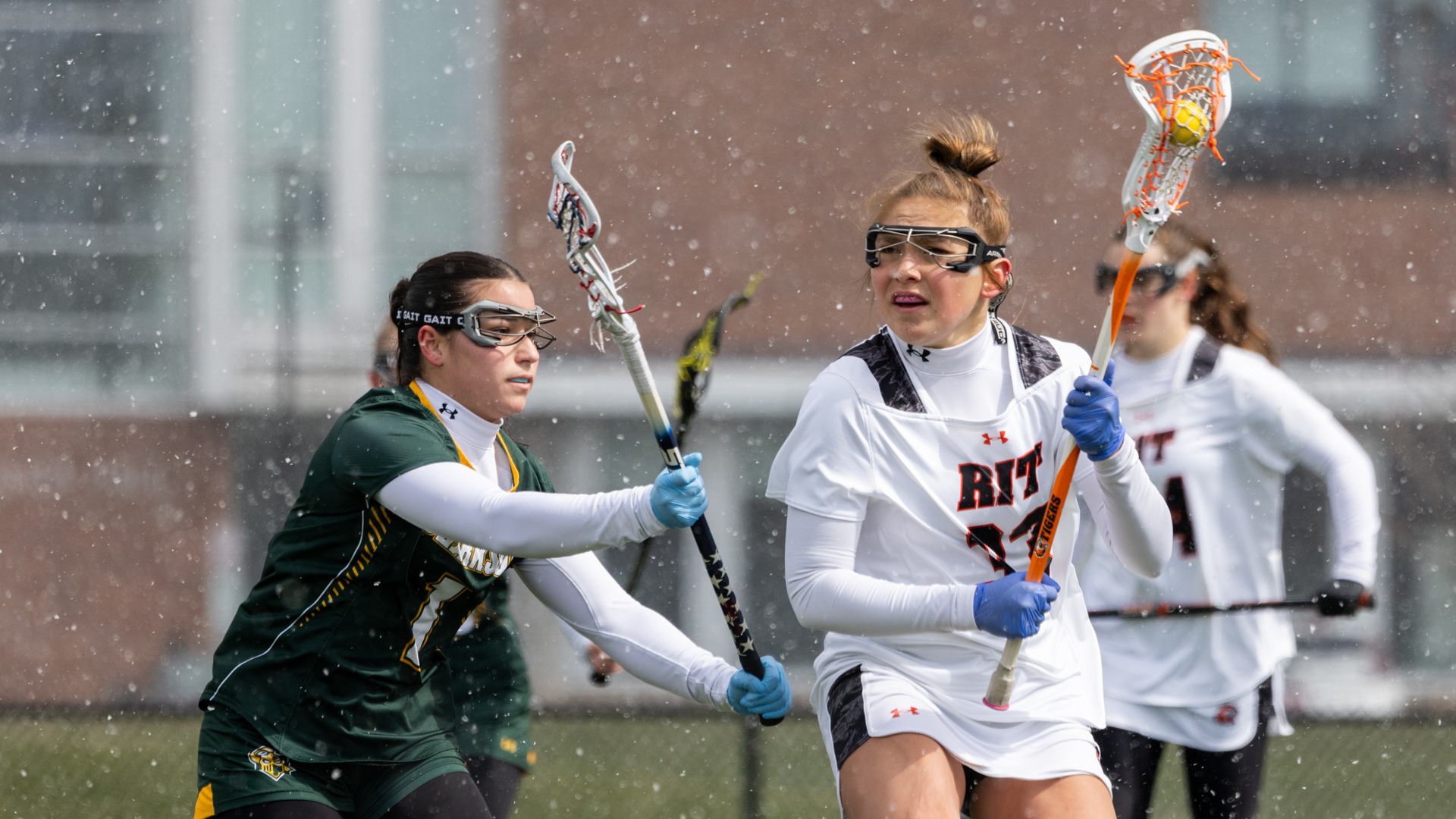 RIT’s Zoe Heffernan, #32, watches for a teammate to pass to on Saturday, Mar. 28, 2026, at Judson Stadium. RIT Women’s Lacrosse Game vs. Clarkson (Sophia Buonpane/RIT Sports Network)