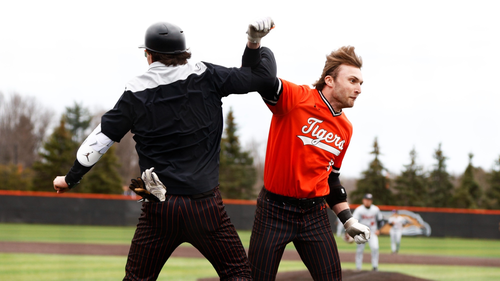 RIT’s Mikey Zacher, #9, celebrates after hitting a grand slam on April. 12, 2026, at Tiger Stadium in Rochester, N.Y. RIT Baseball defeats Bard Baseball 18-1. RIT Baseball vs Alfred St. (Sawyer Emery/RIT Sports Network).